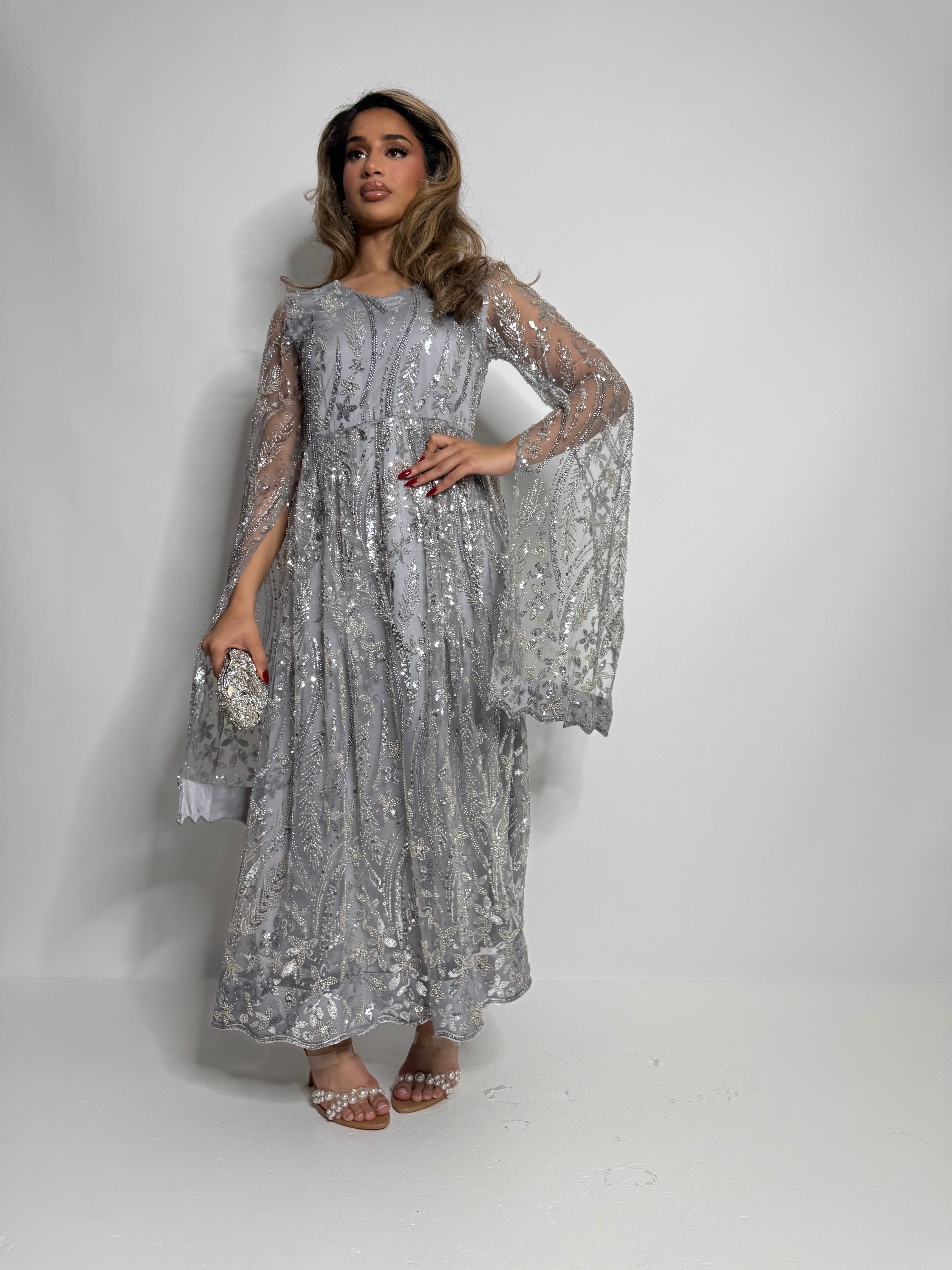 Couture-inspired silver Pakistani dress with embroidered detailing