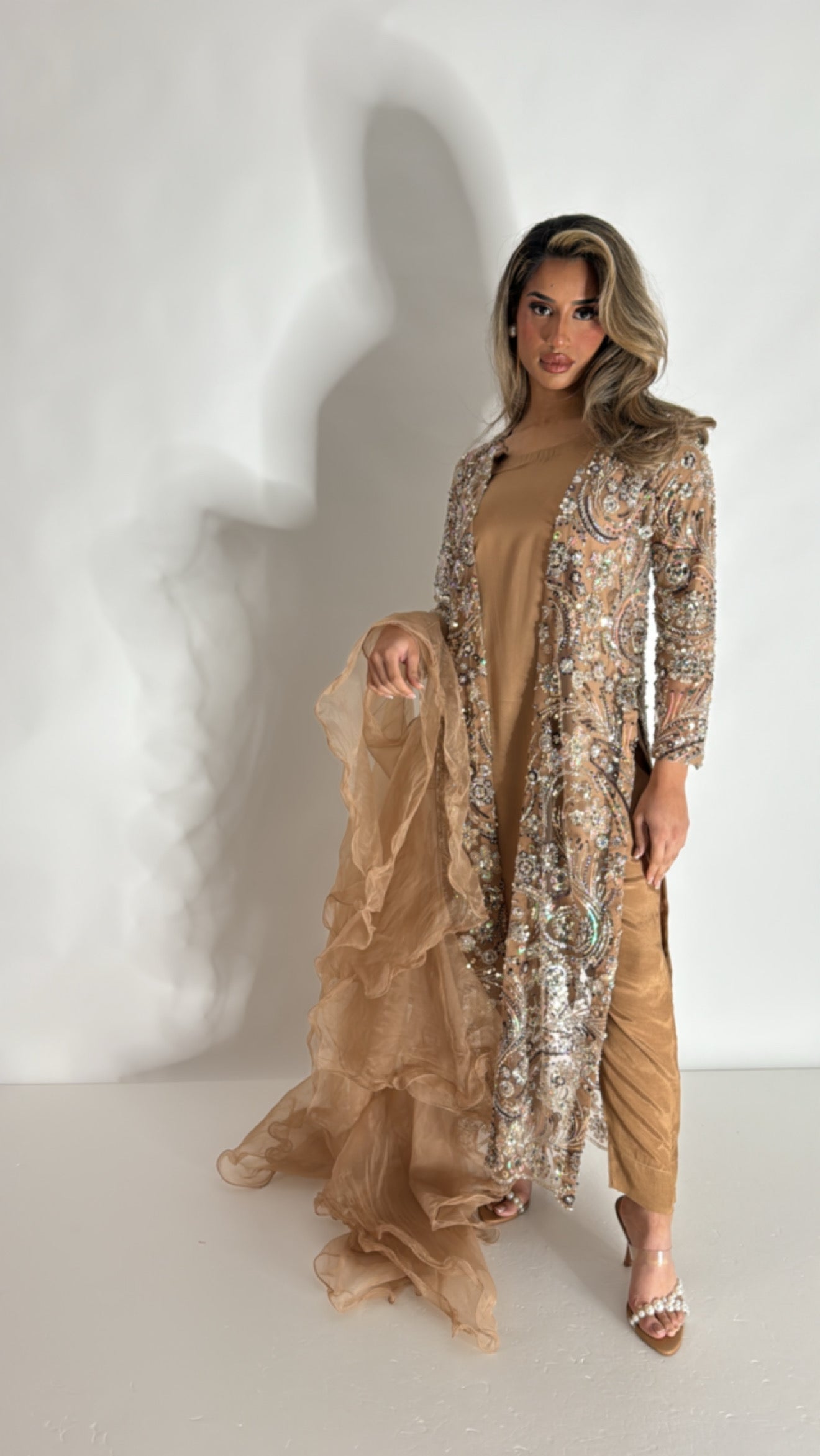 Mocha cutdana embroidered Pakistani suit with slip, embellished jacket, frill dupatta and trousers.