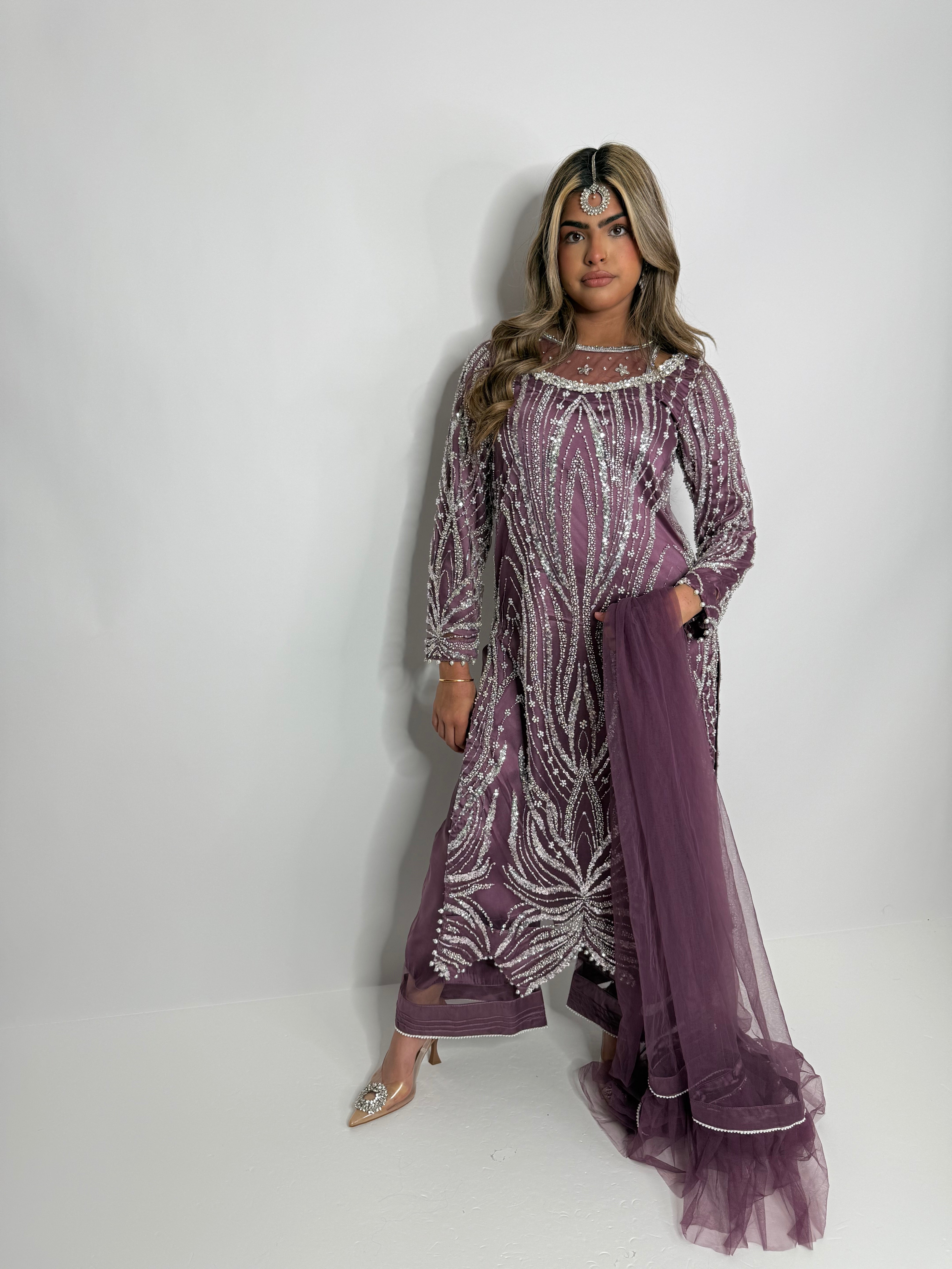 Ameliyana Boutique Aveline Mauve Embellished Three-Piece with cutdana embroidery, pearl-detailed hem, silk trousers, and net dupatta with frill