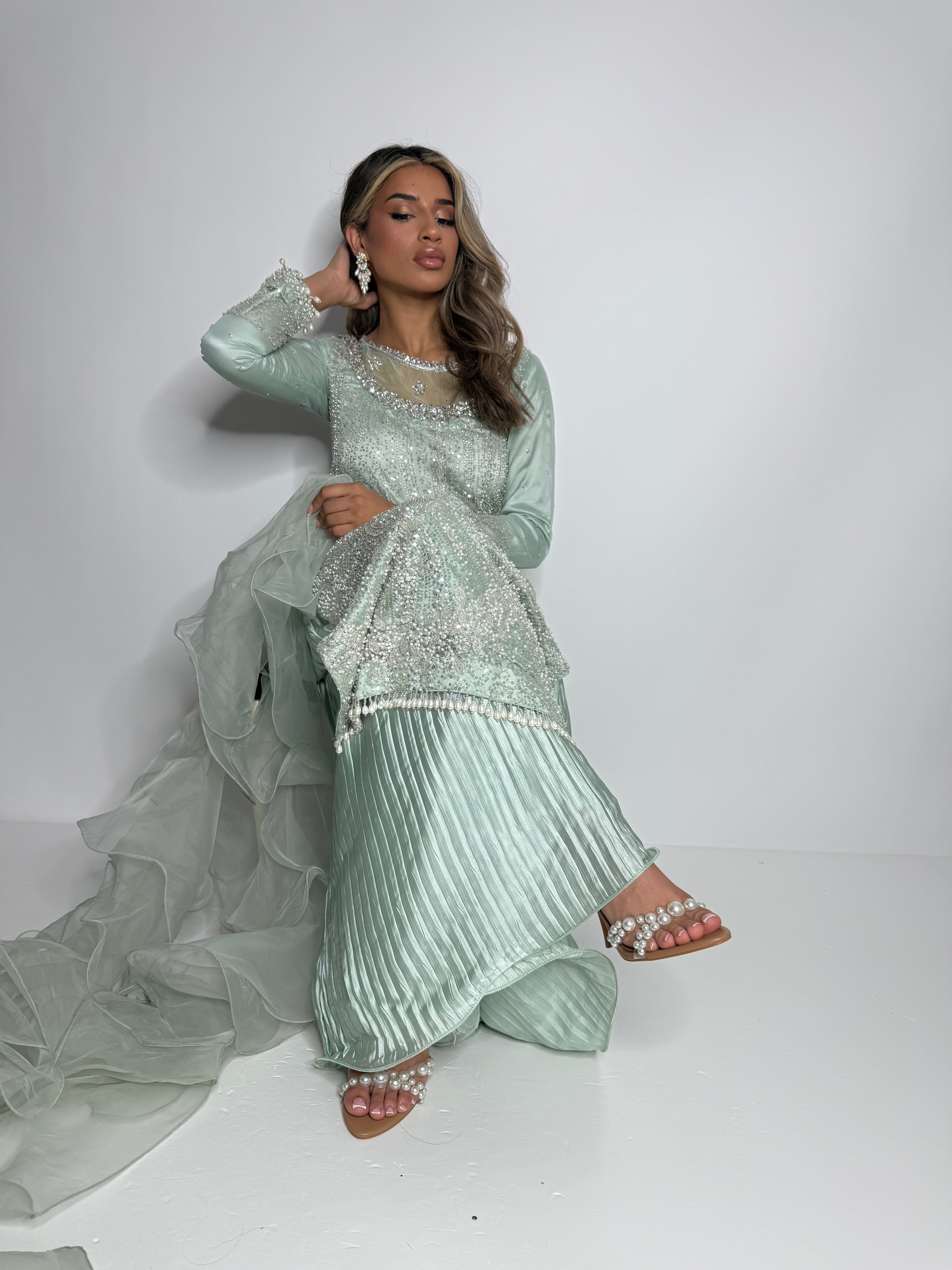 Girl dressed in Pakistani wedding guest outfit from Ameliyana boutique