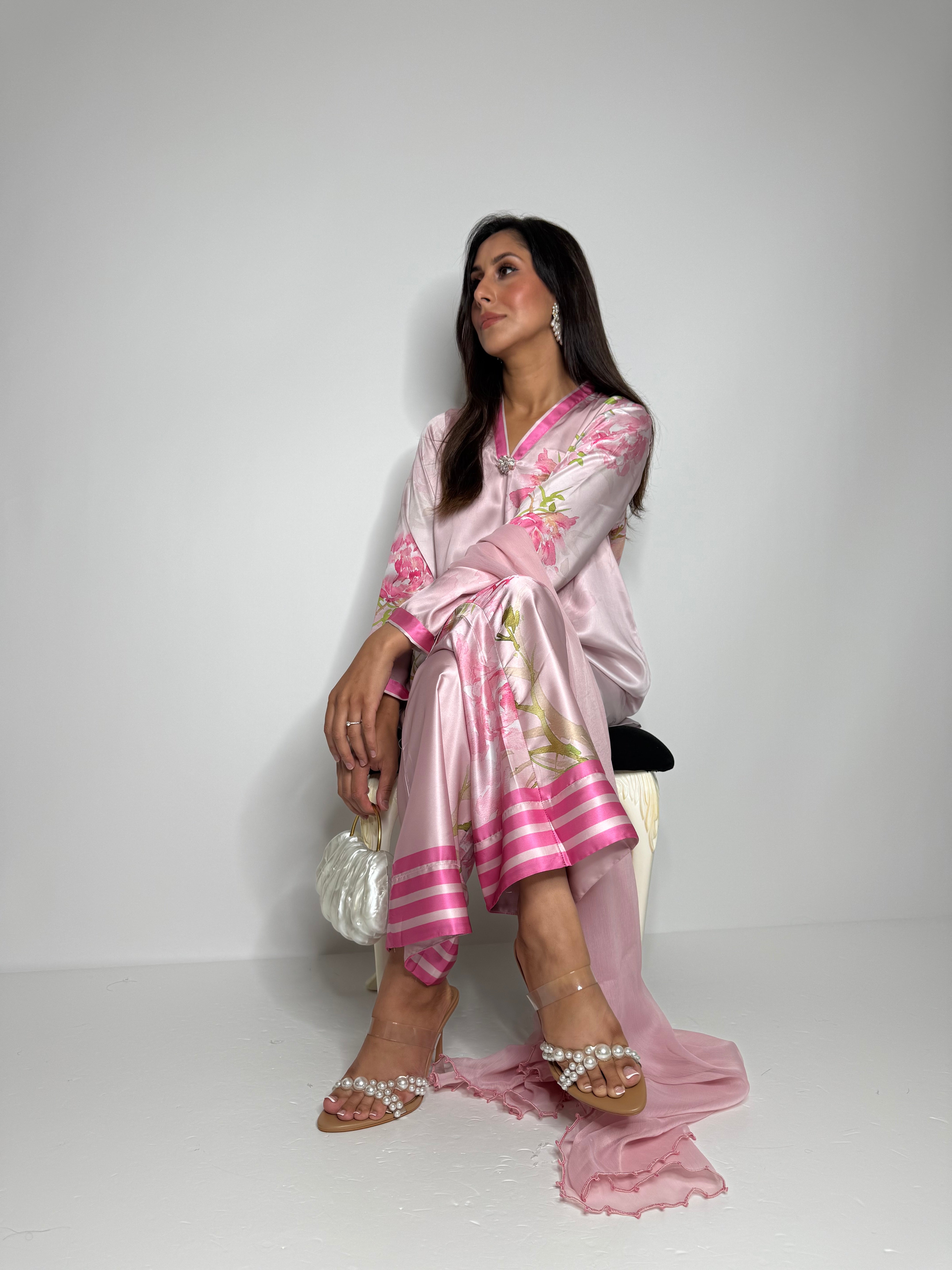 Limelight silk Pakistani suit in pastel pink with floral prints, wide trousers, and chiffon dupatta.