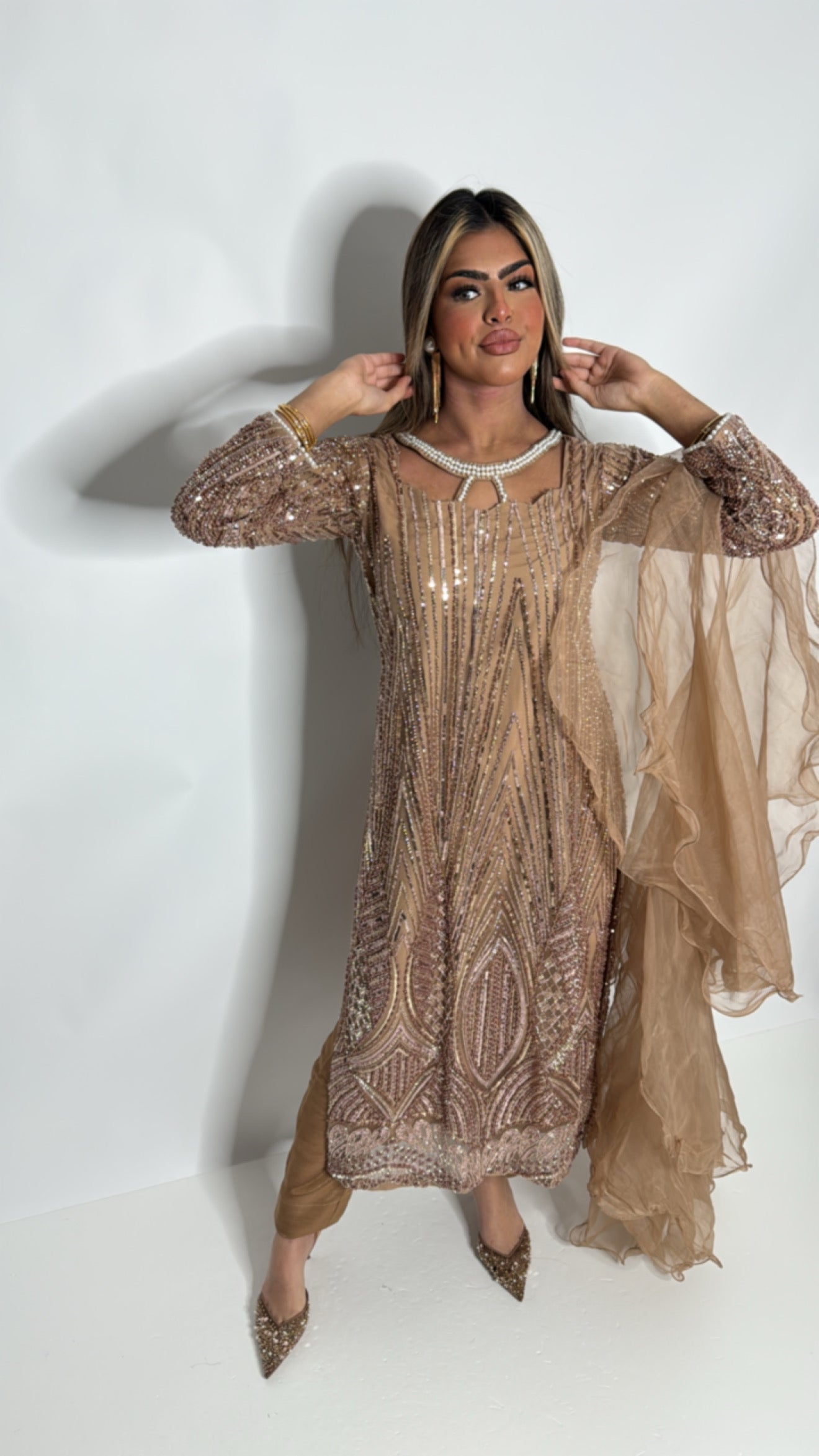 Elegant Pakistani three-piece suit ideal for Eid, weddings and formal events