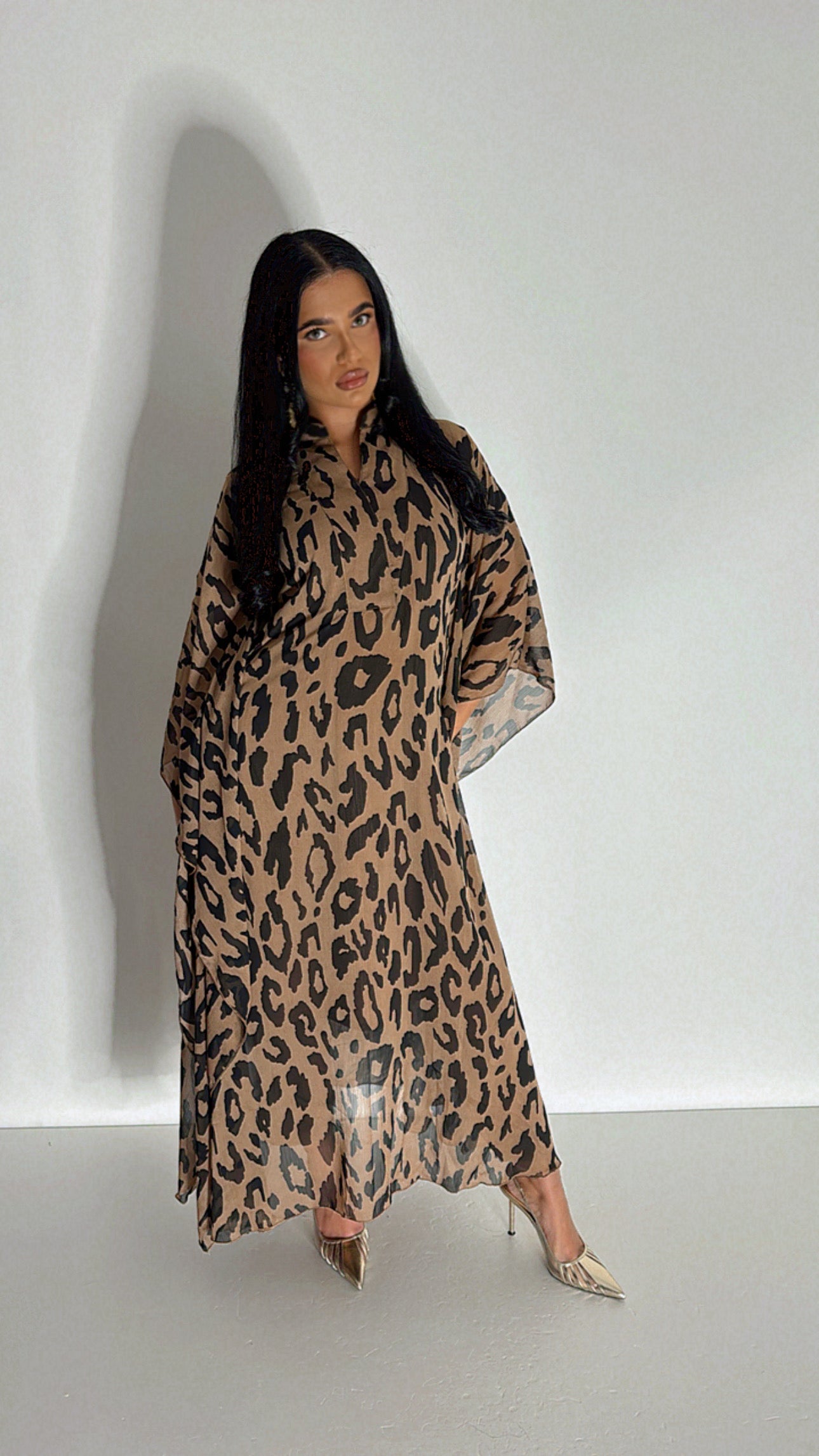Chiffon leopard kaftan with relaxed fit, perfect for daawats and modest glam looks.