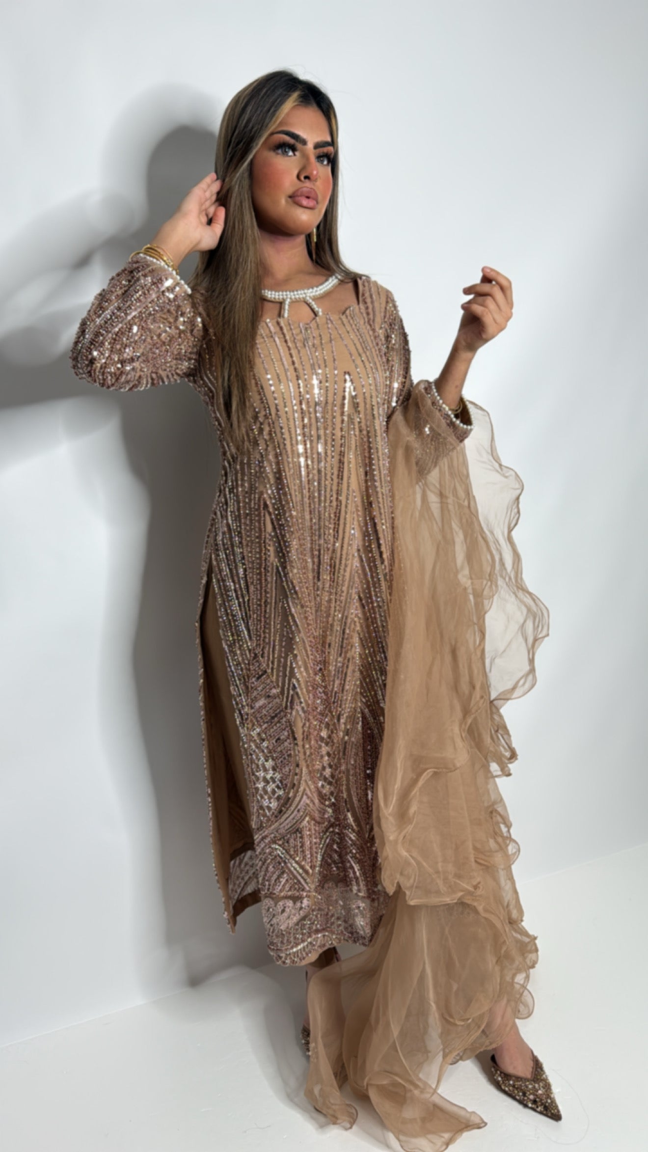 Modern Pakistani occasionwear outfit with structured yet modest silhouette