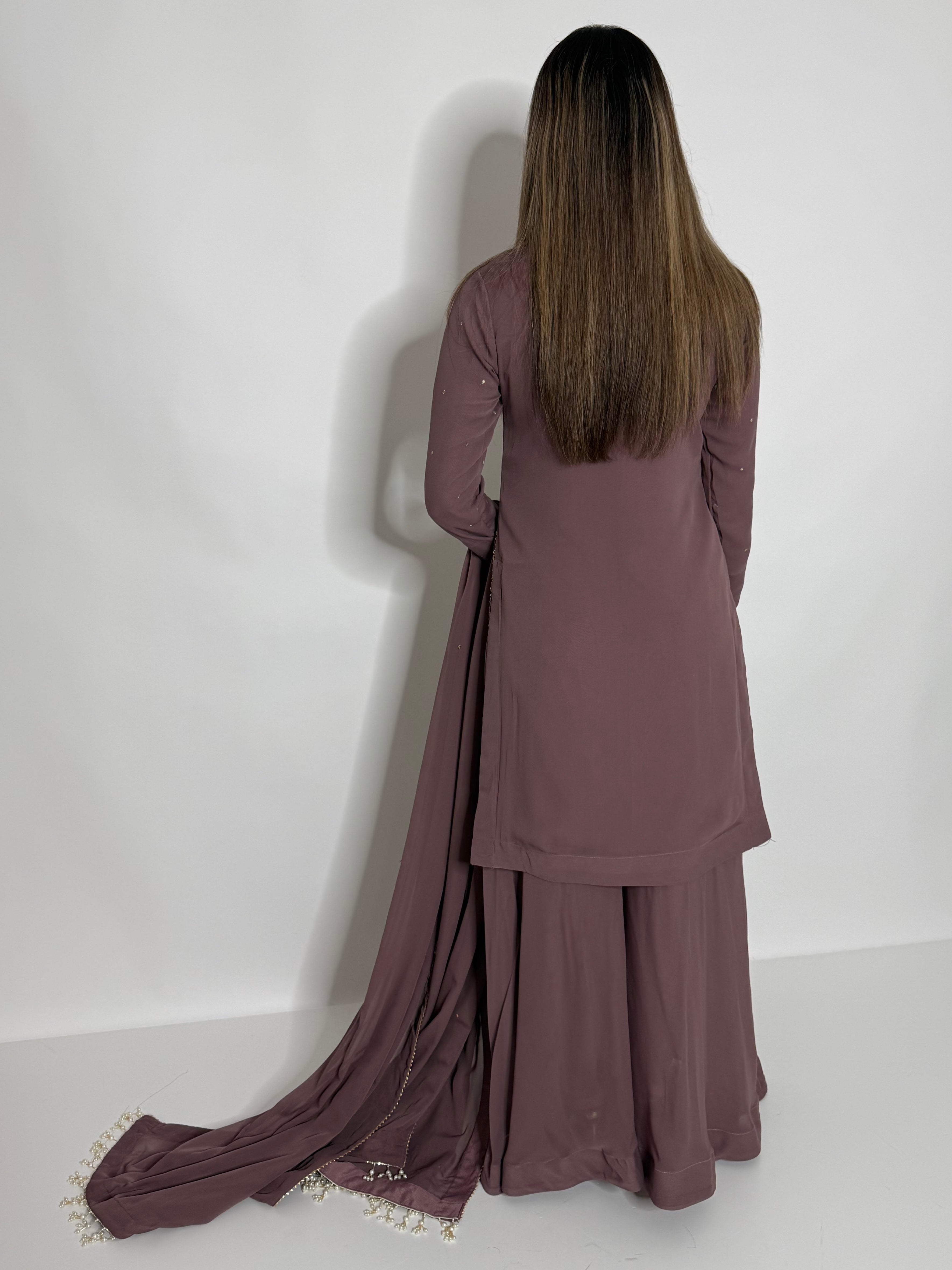 Modest taupe sharara suit with pearl dupatta finishing