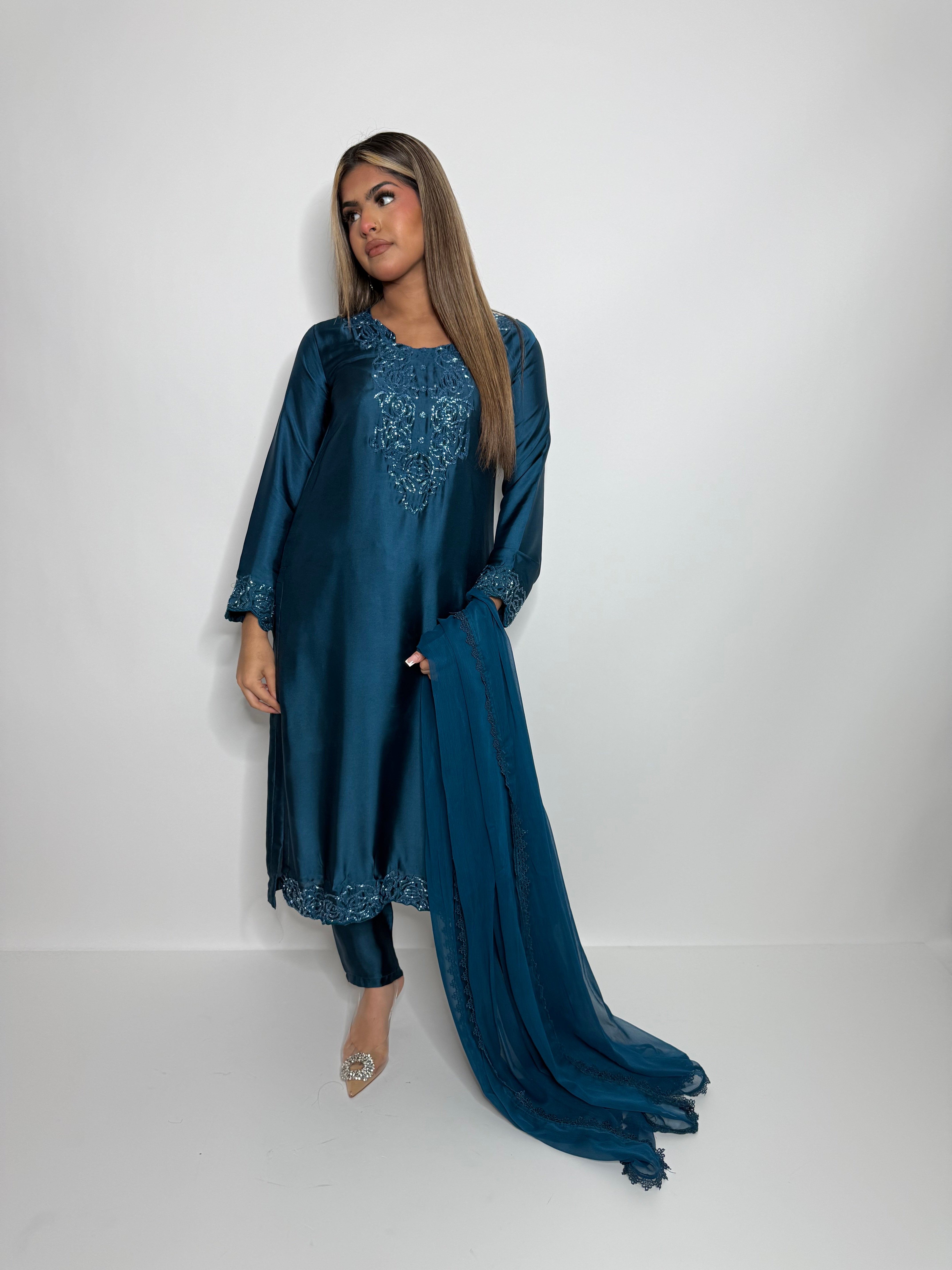 Teal blue silk embroidered three-piece outfit with chiffon dupatta by Ameliyana Boutique