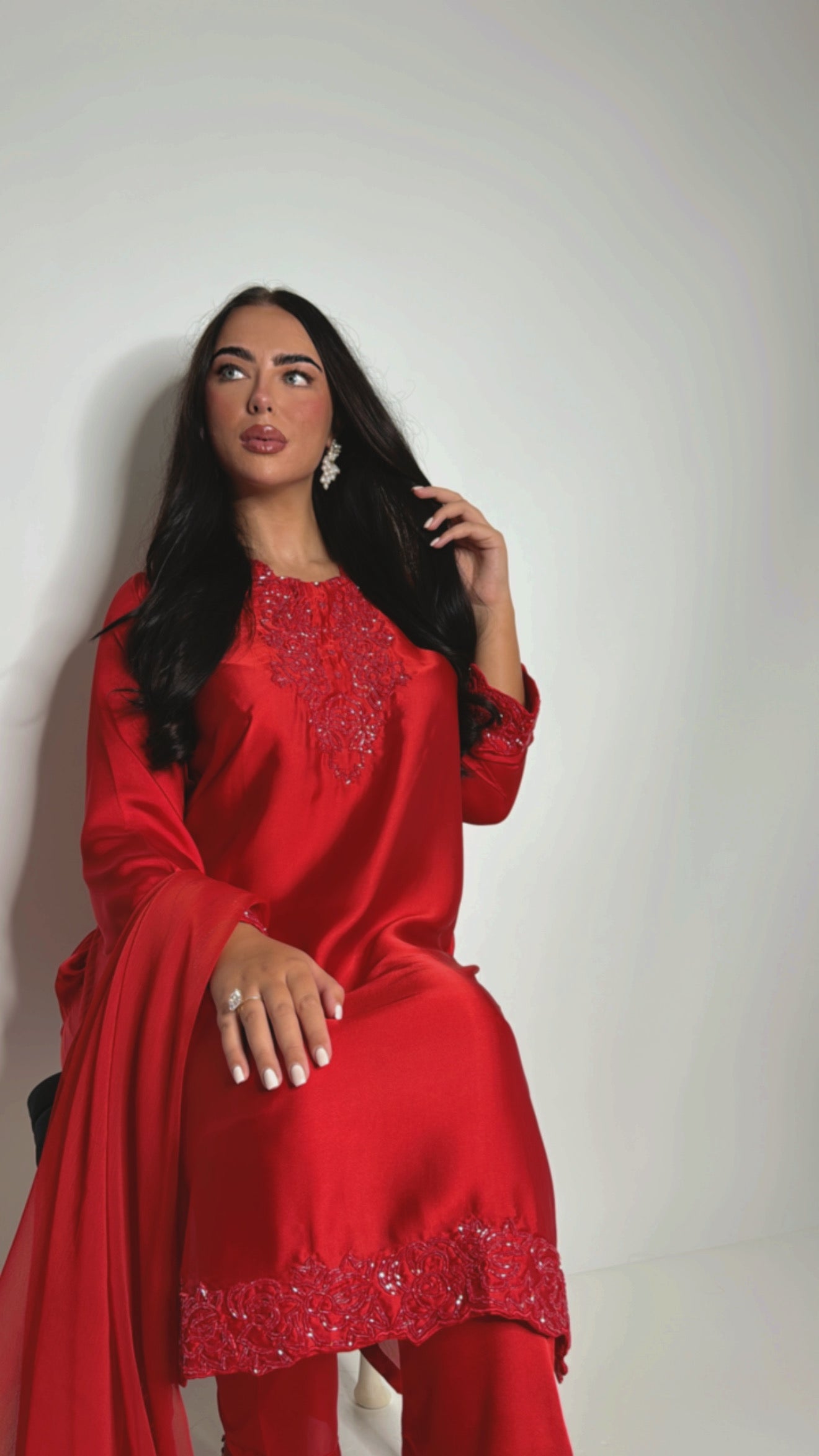 Desi festive outfit — red embroidered satin Pakistani suit with dupatta