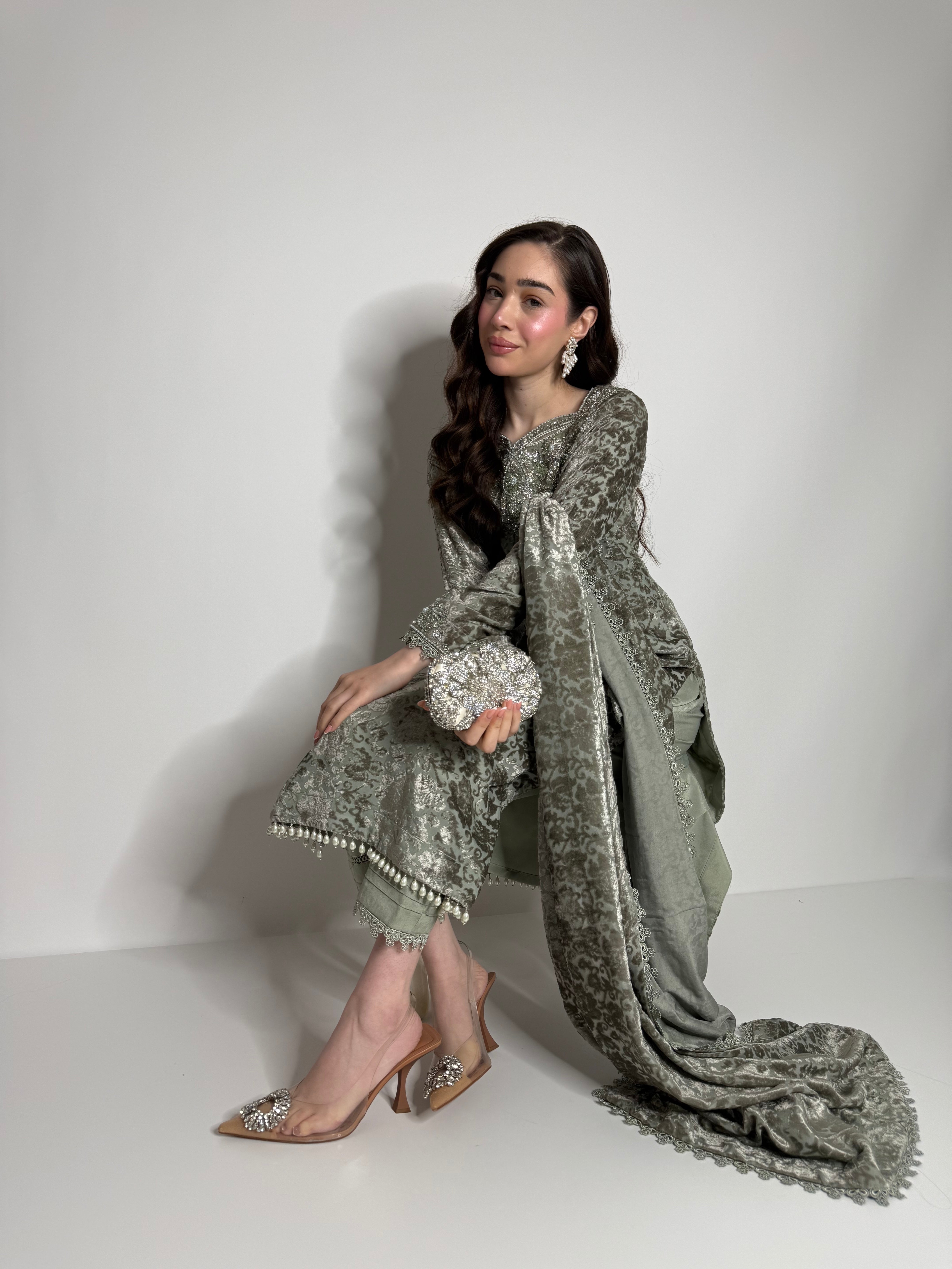 Pakistani sage palachi outfit with handworked neckline