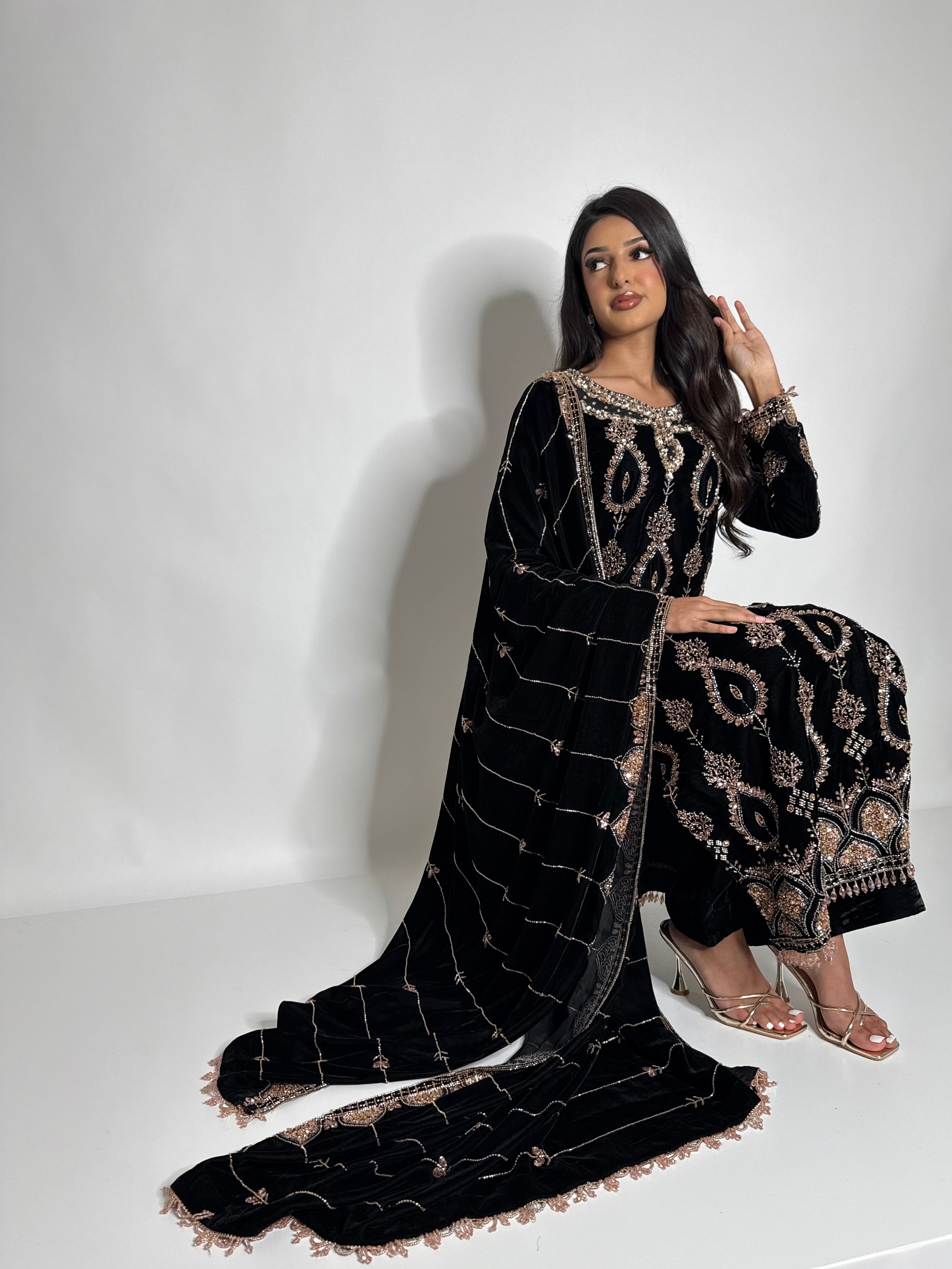 Luxury black velvet Pakistani suit with gold cutdana embroidery and embroidered velvet shawl