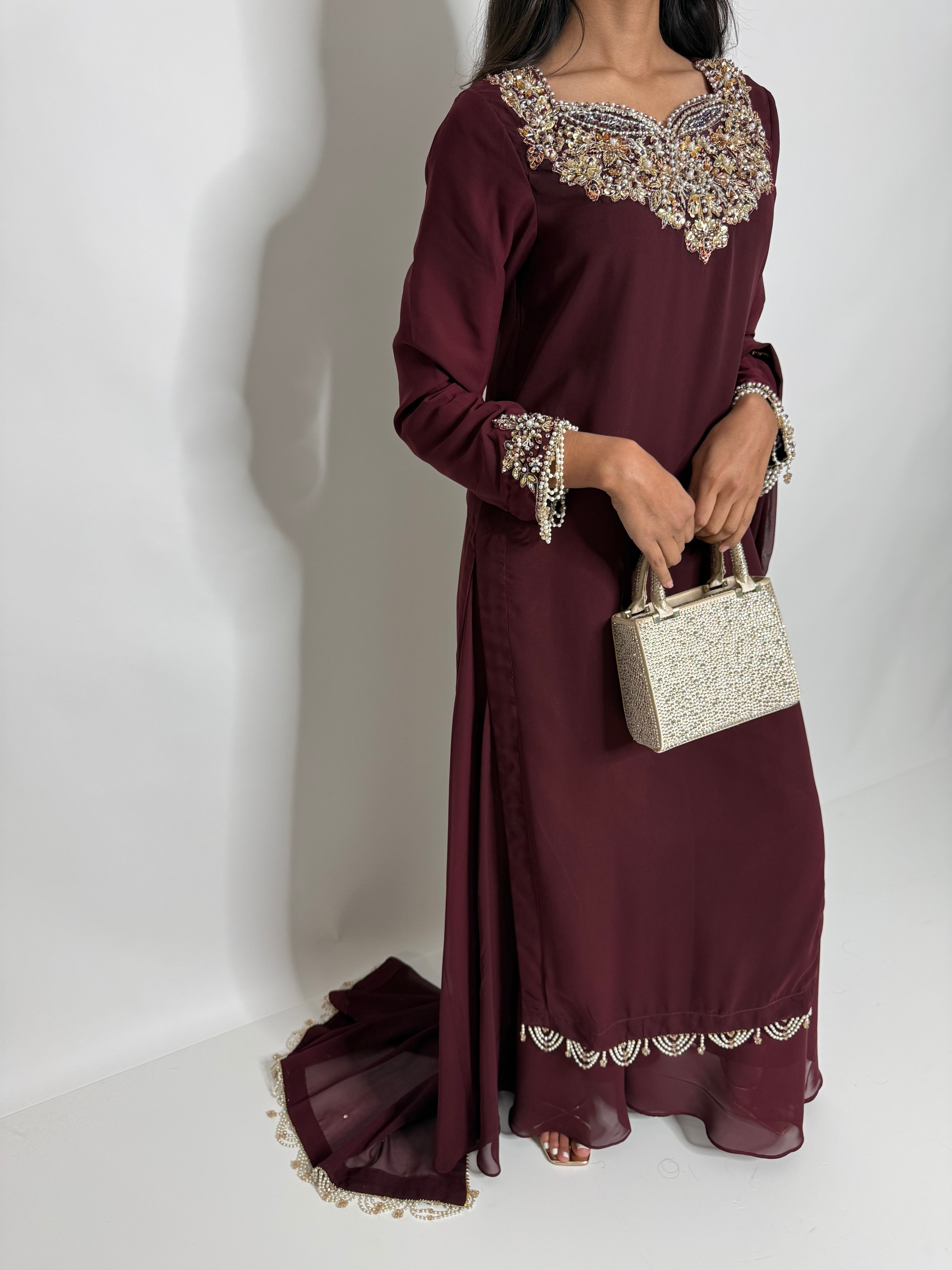 Maroon georgette sharara suit with statement embroidered neckline