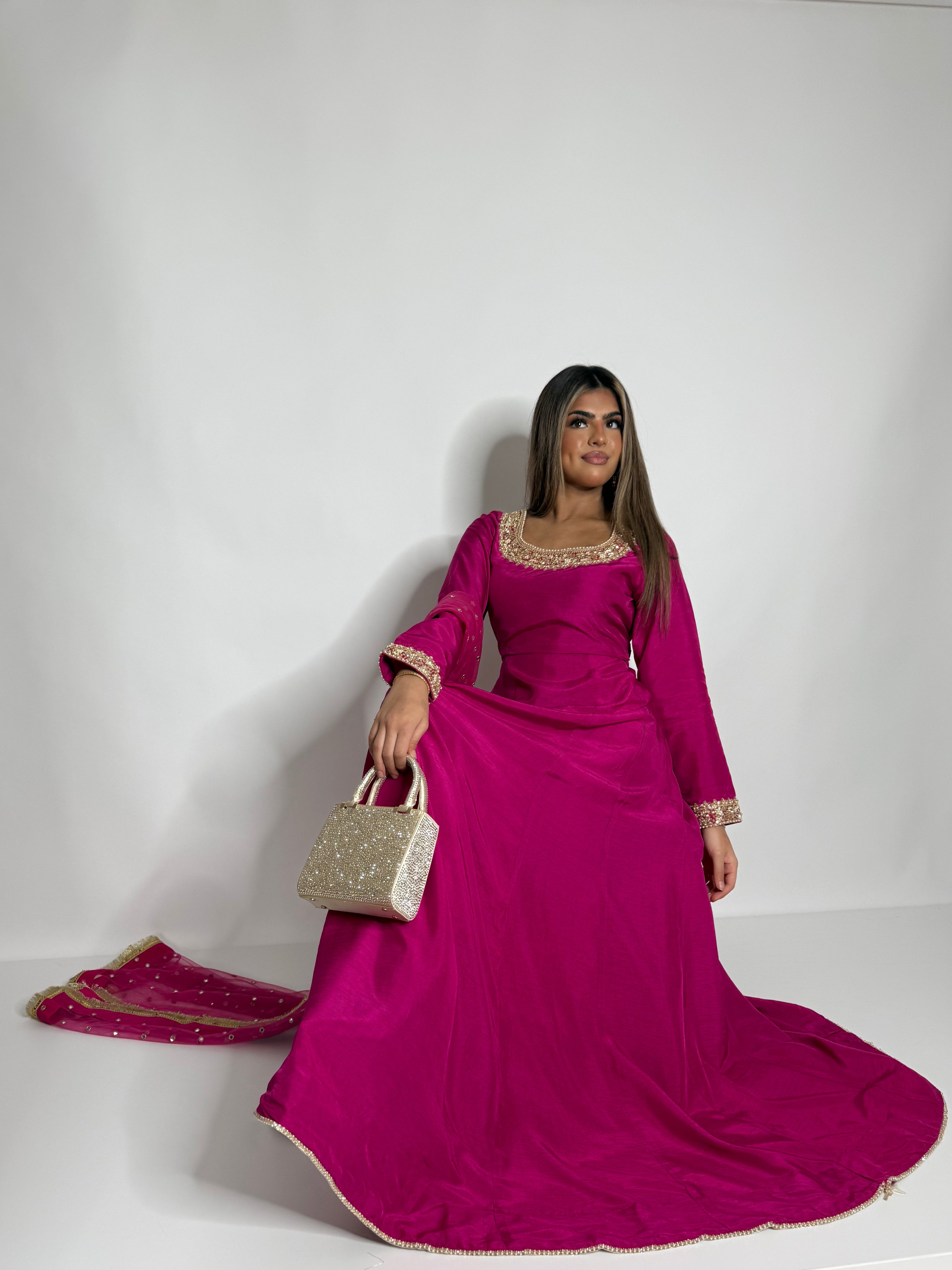Pakistani raw silk wedding guest dress in fuchsia