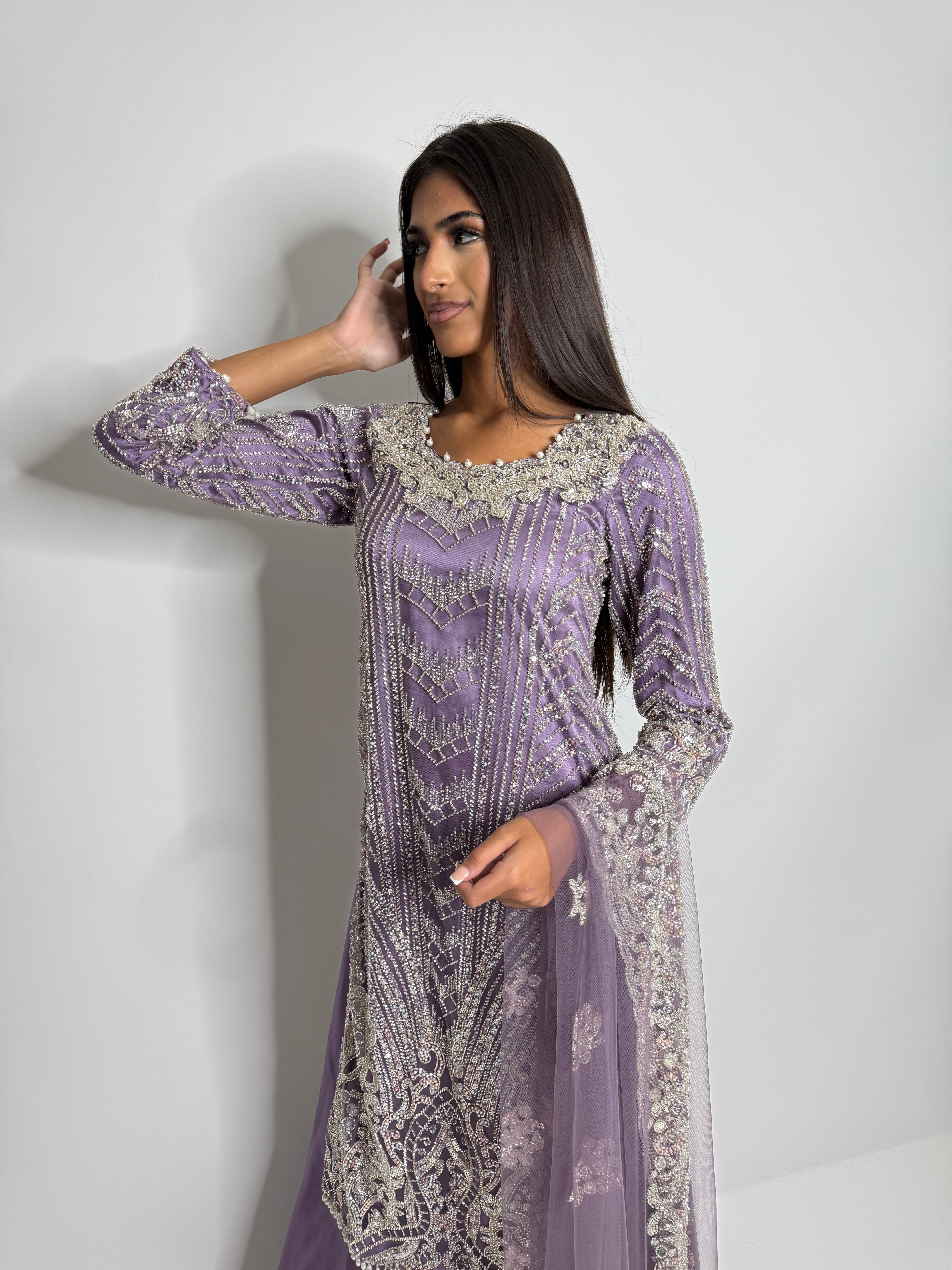 Pakistani luxury suit in lavender tones with intricate embellishment