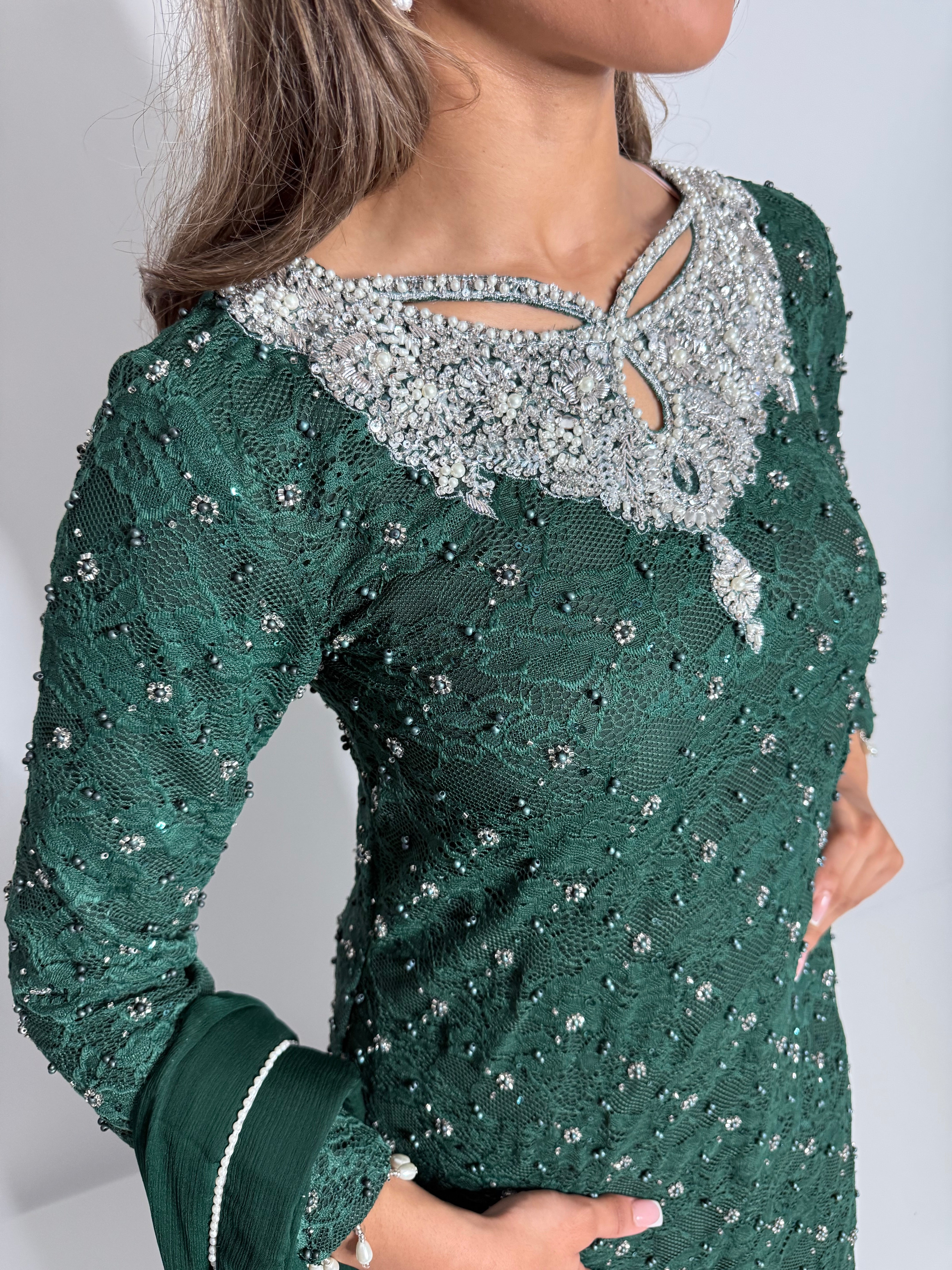 Emerald green Pakistani outfit with pearl embroidery, handworked neckline, and chiffon dupatta with organza frill – Ameliyana Boutique