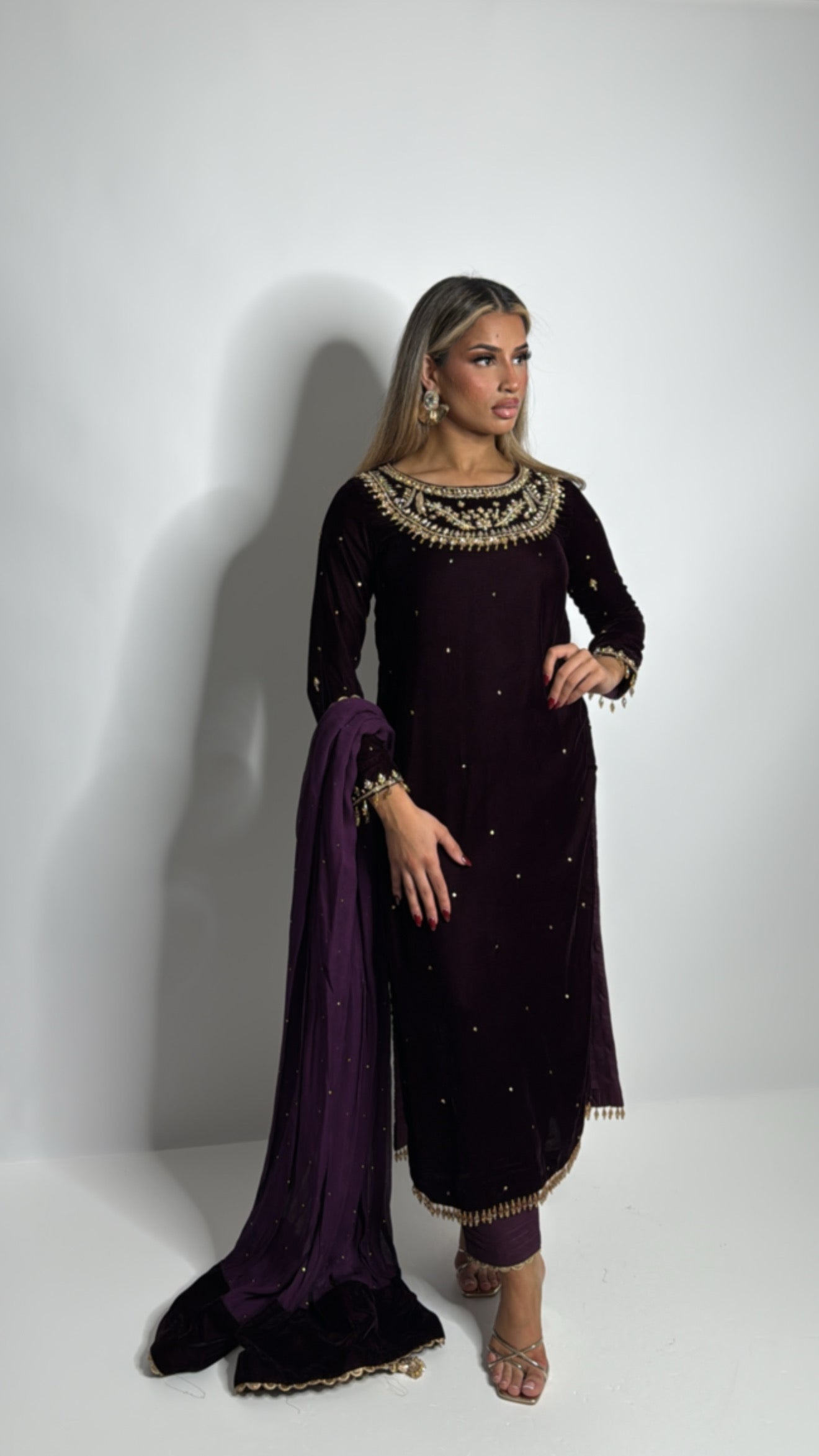 Plum micro velvet Pakistani suit with chiffon dupatta and gold neckline