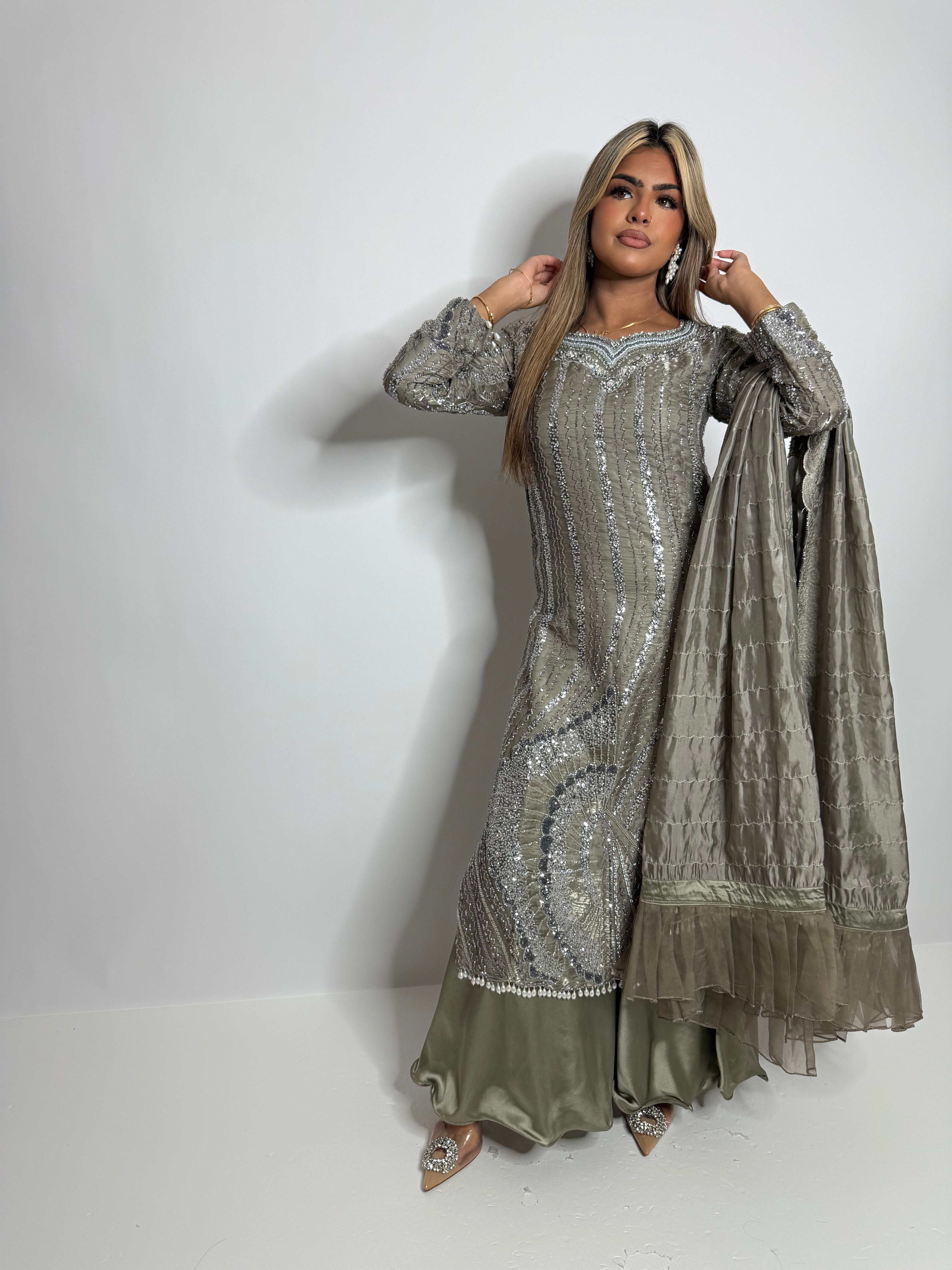 Luxury Pakistani suit in smoky sage with shimmering silver details