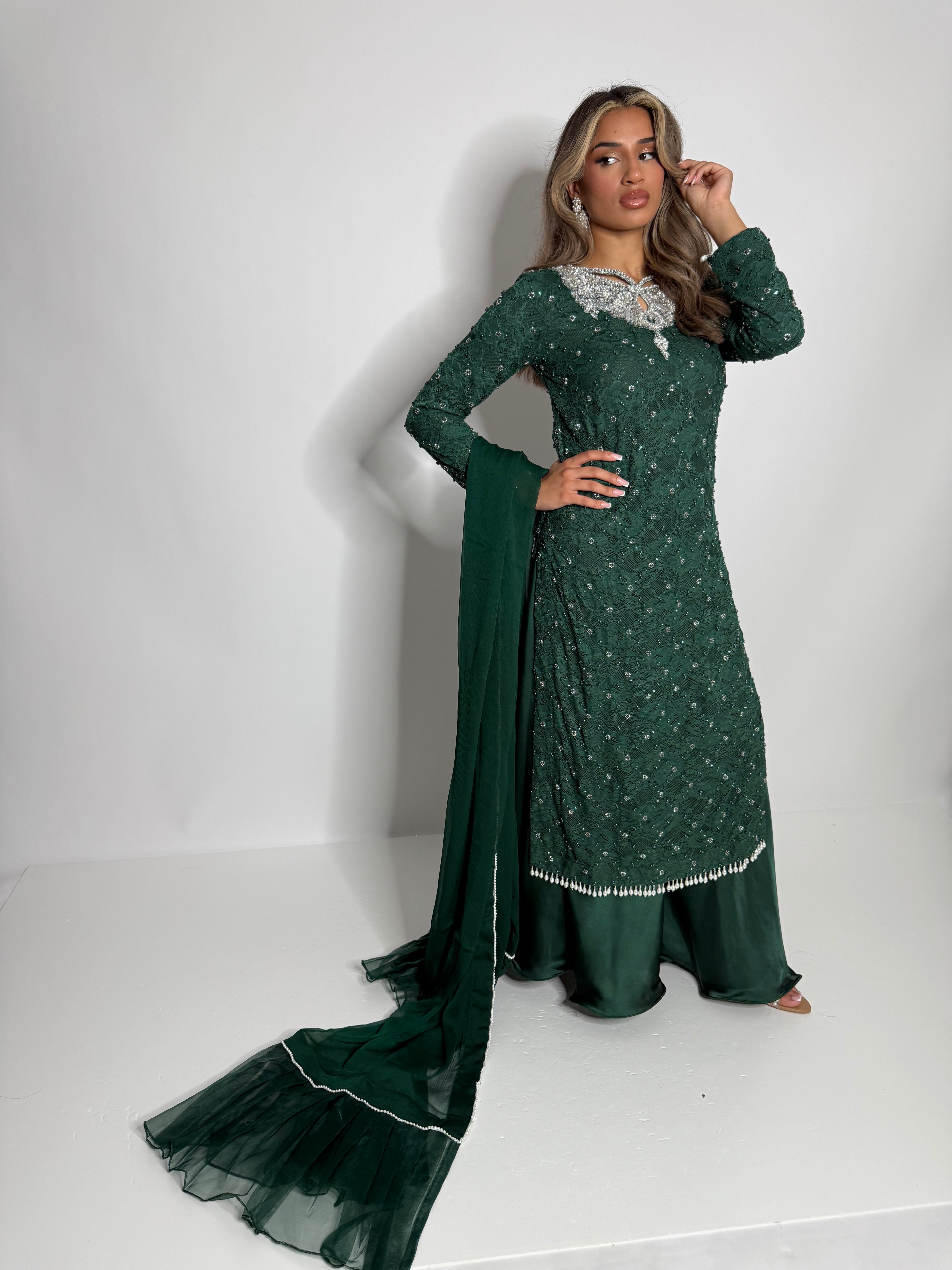 Ameliyana Boutique Serenya Emerald Pearl-Embellished Three-Piece with pearl-detailed fabric, embroidered neckline, silk trousers, and chiffon dupatta with organza frill