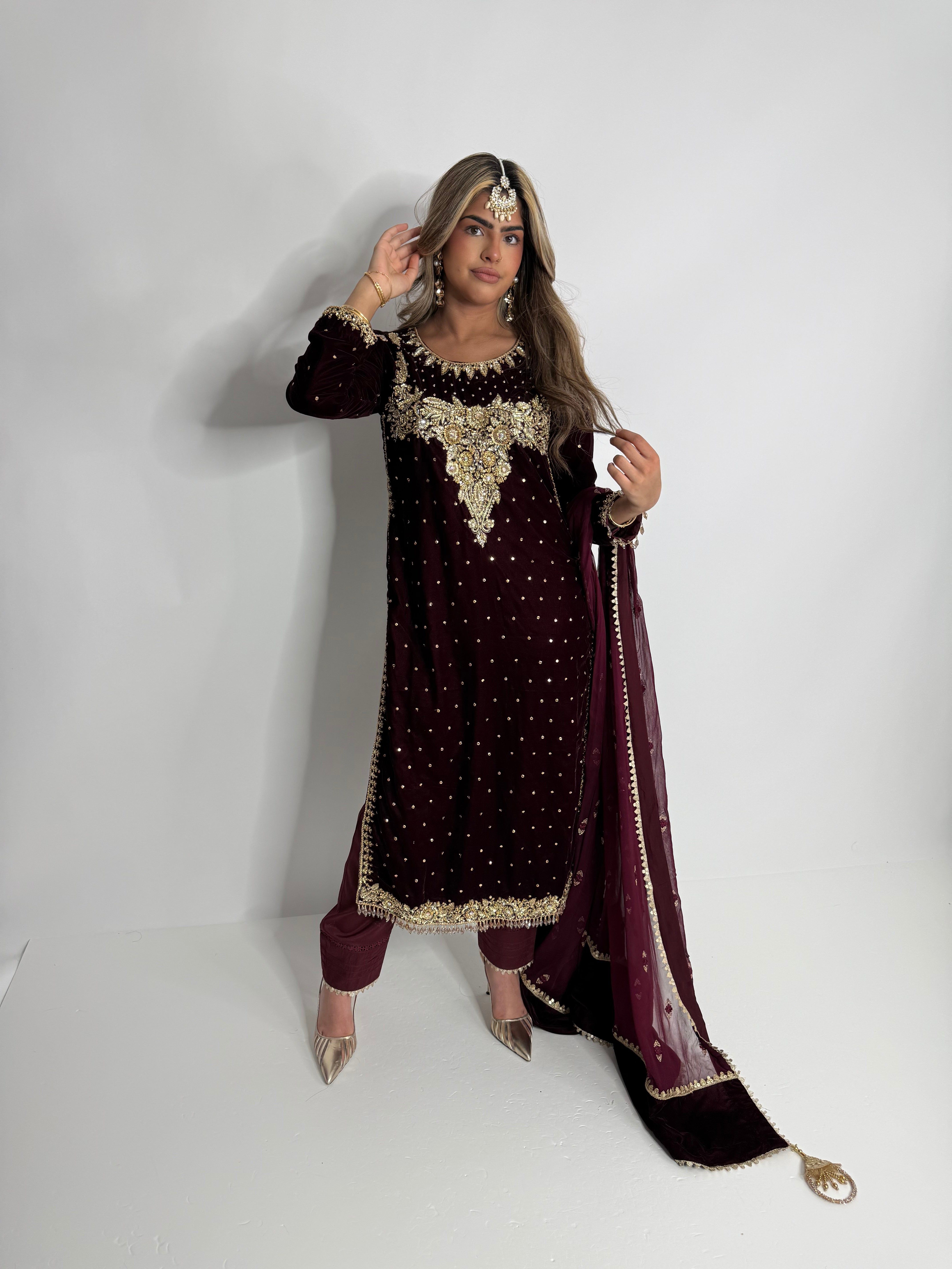 Full-length shot of Maeryn Maroon Velvet Wedding Suit styled for formal occasions.