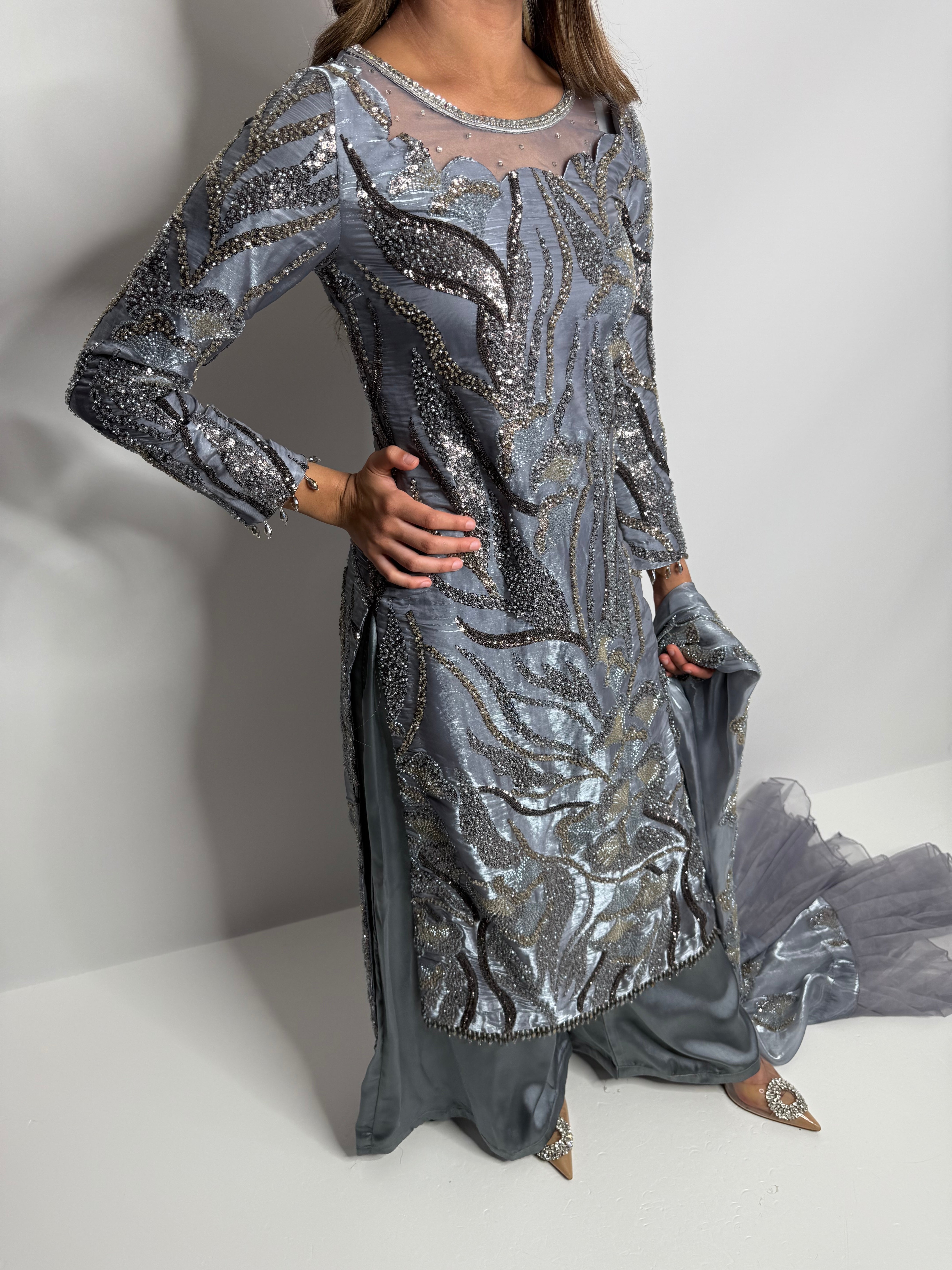 Pakistani evening wear. cutdana outfit with delicate embroidery