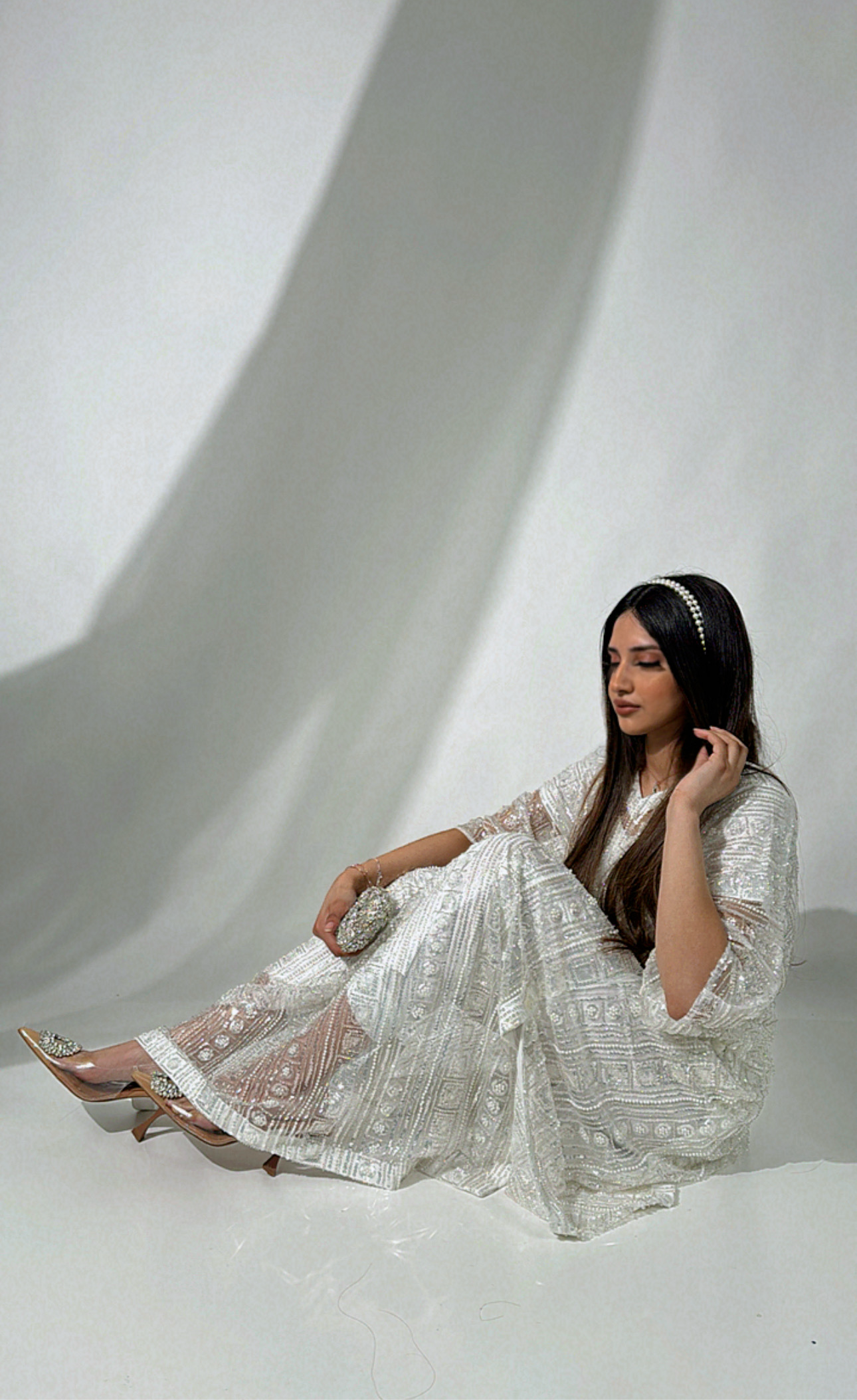 White Pakistani wedding guest outfit with pearl details