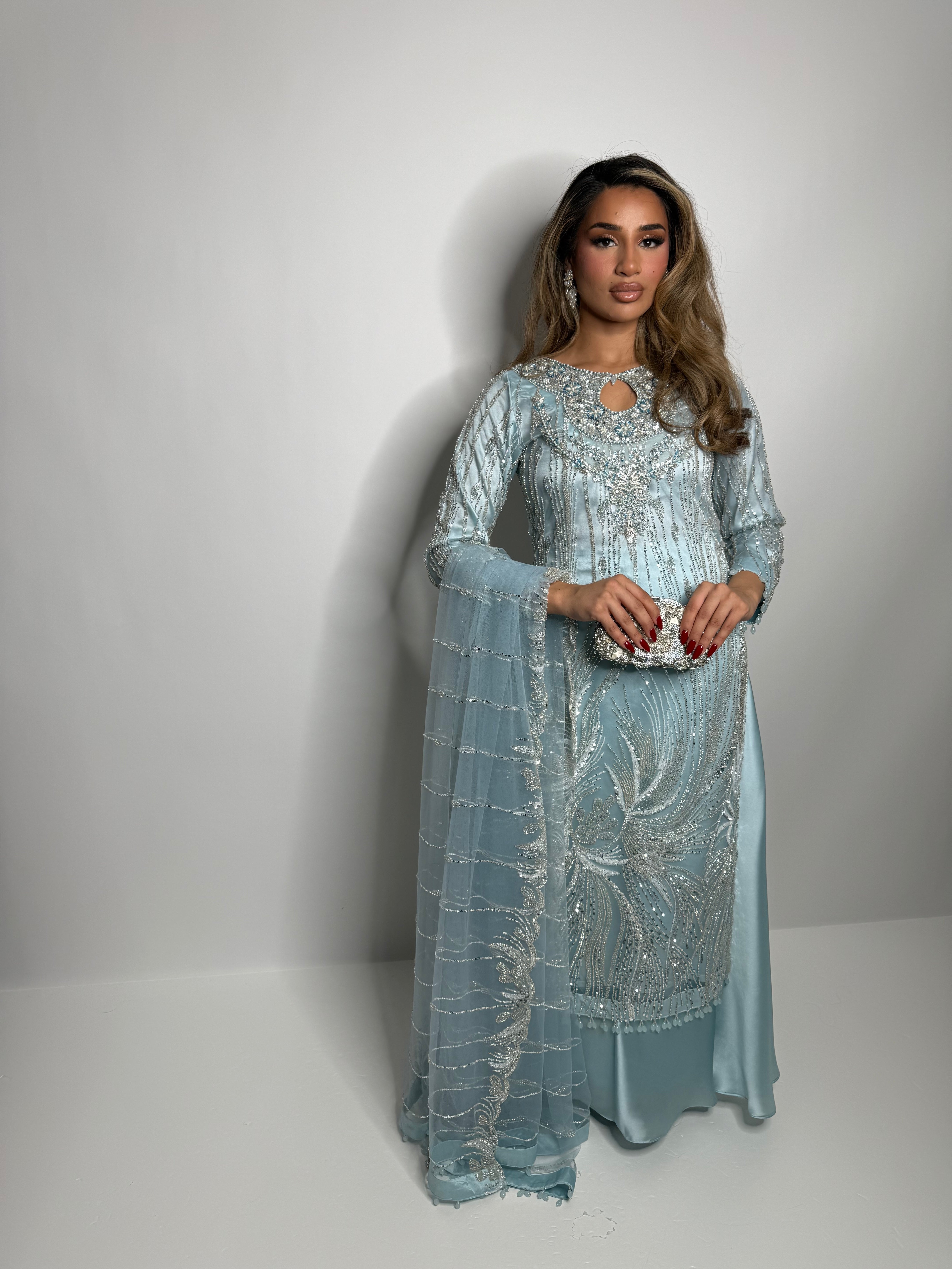 Full view of Cyrine Pakistani sharara suit in ice blue silk with hand embroidery