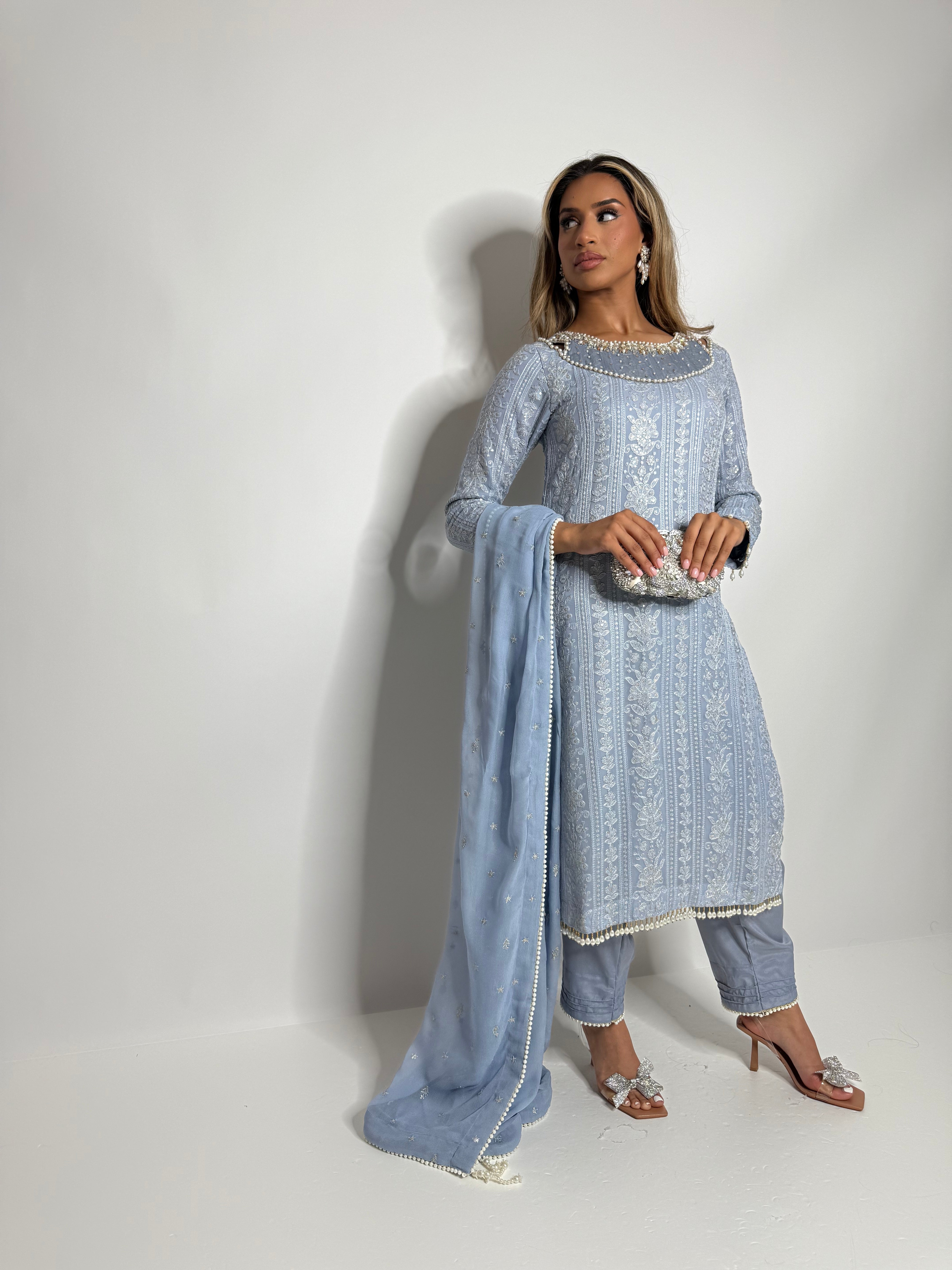Elegant Pakistani Eid outfit in pastel blue with embroidery