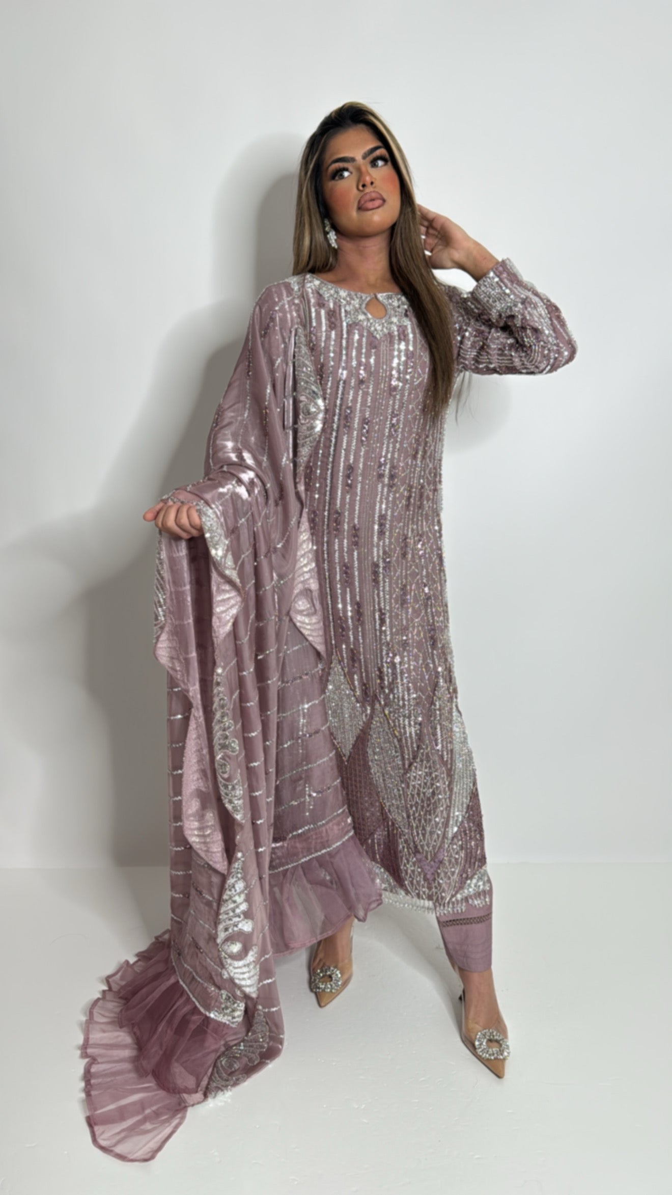 Heavy embroidery front, back, and sleeves with pearl detailing