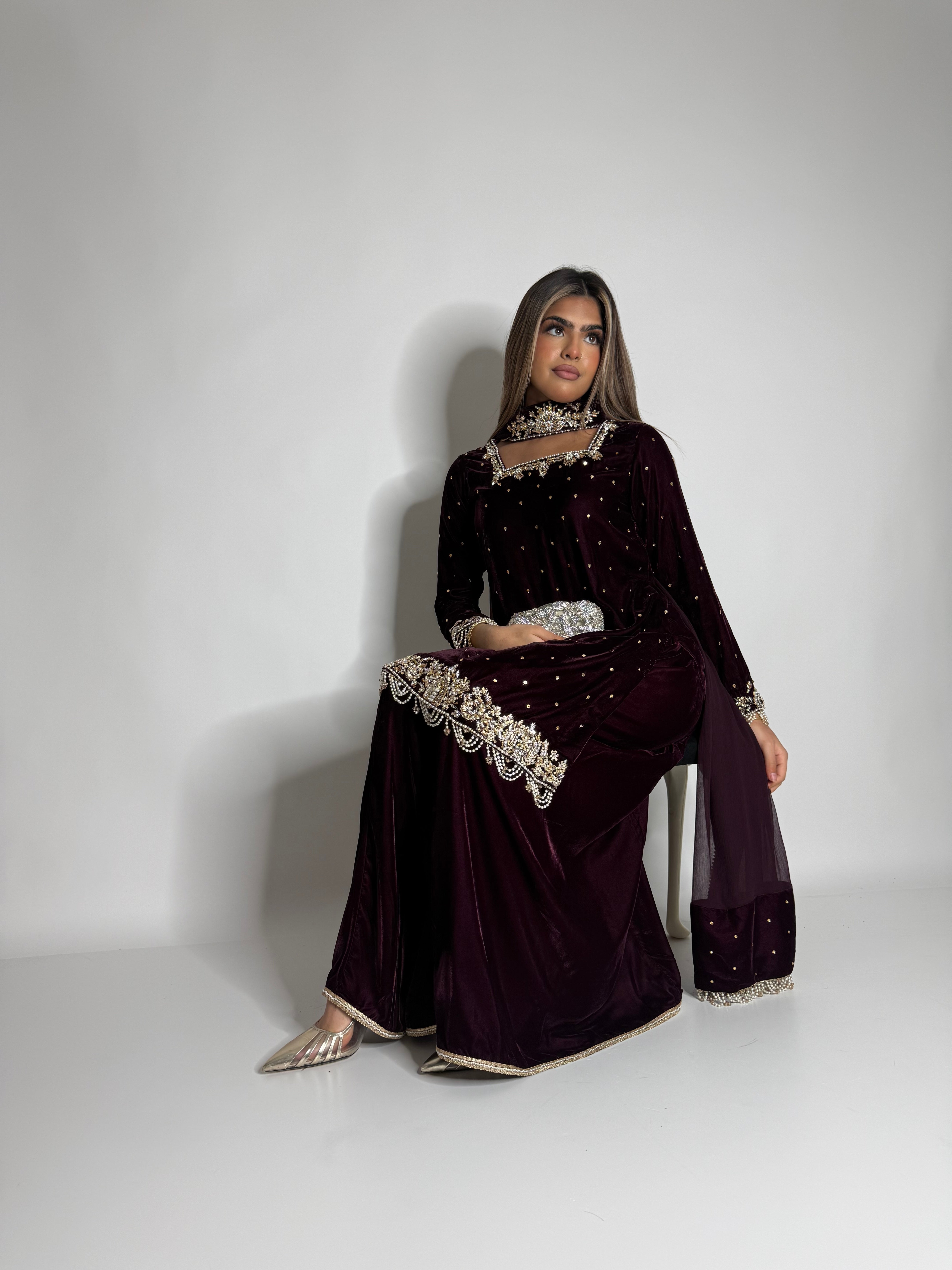 Luxury micro velvet fabric texture with gold embellishment
