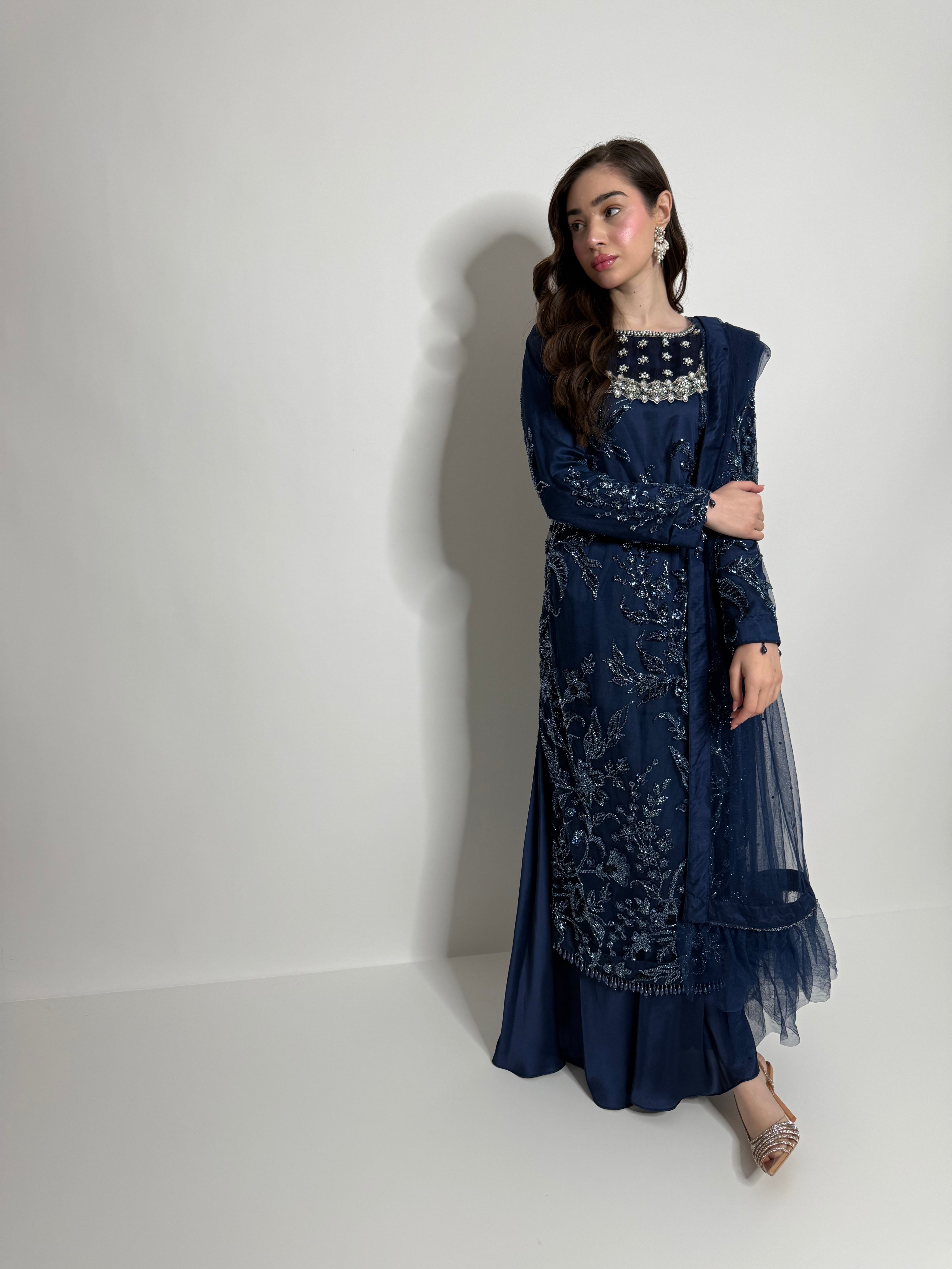 Navy silk three-piece outfit with heavy cutdana and pearl embroidery, front view