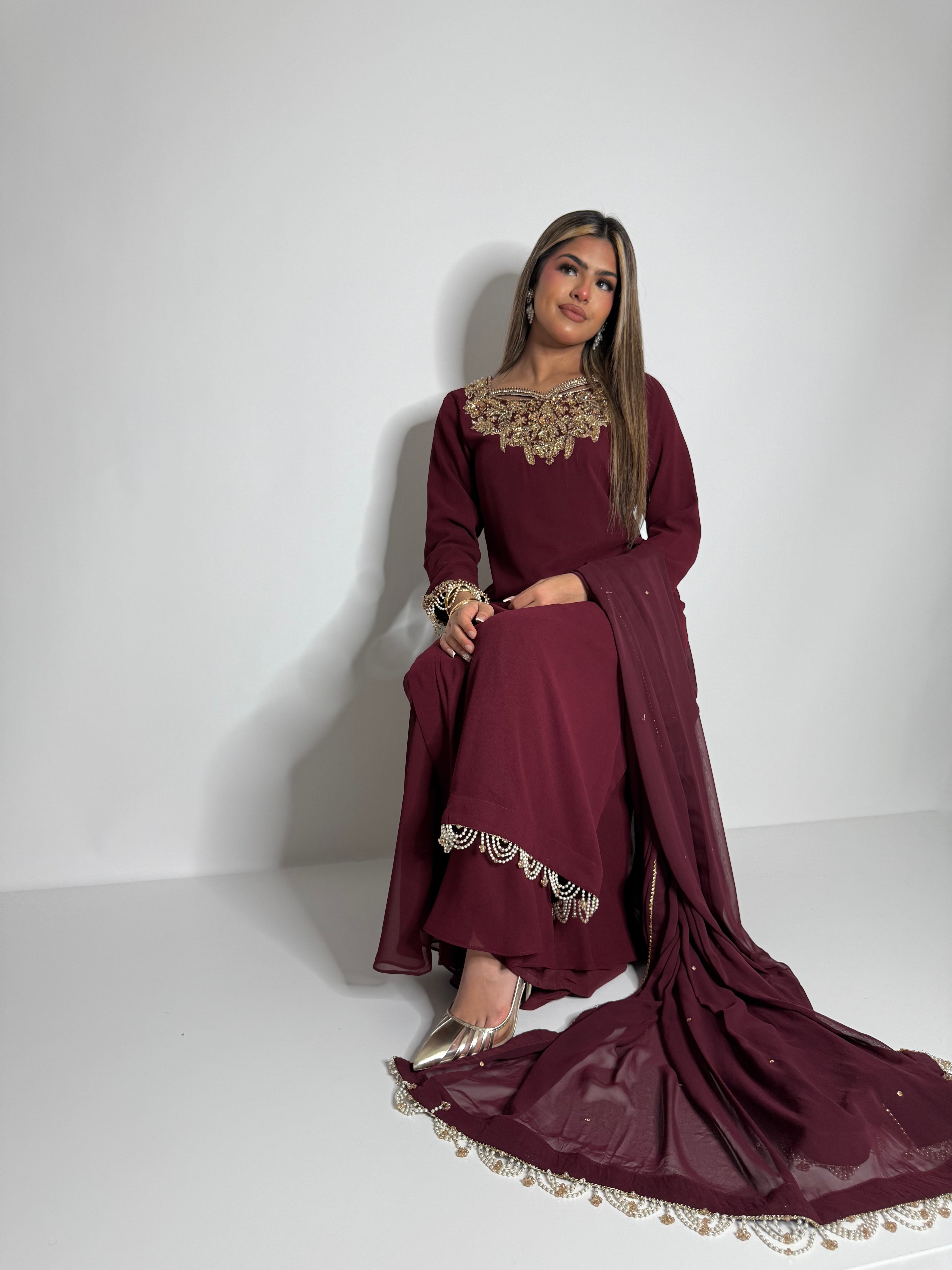 Maroon embroidered outfit with pearl hem detailing