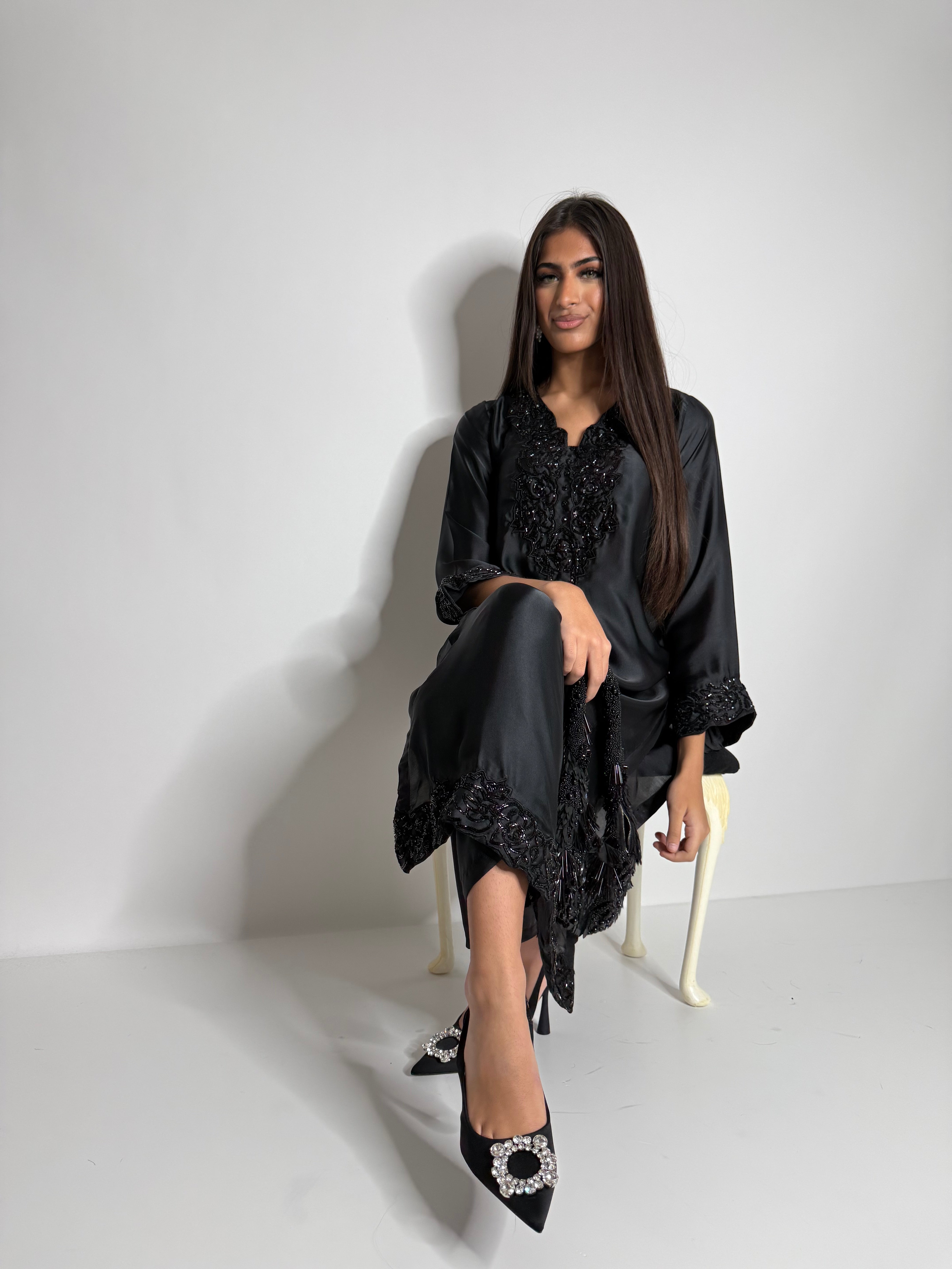 Elegant black silk Eid outfit with chiffon dupatta