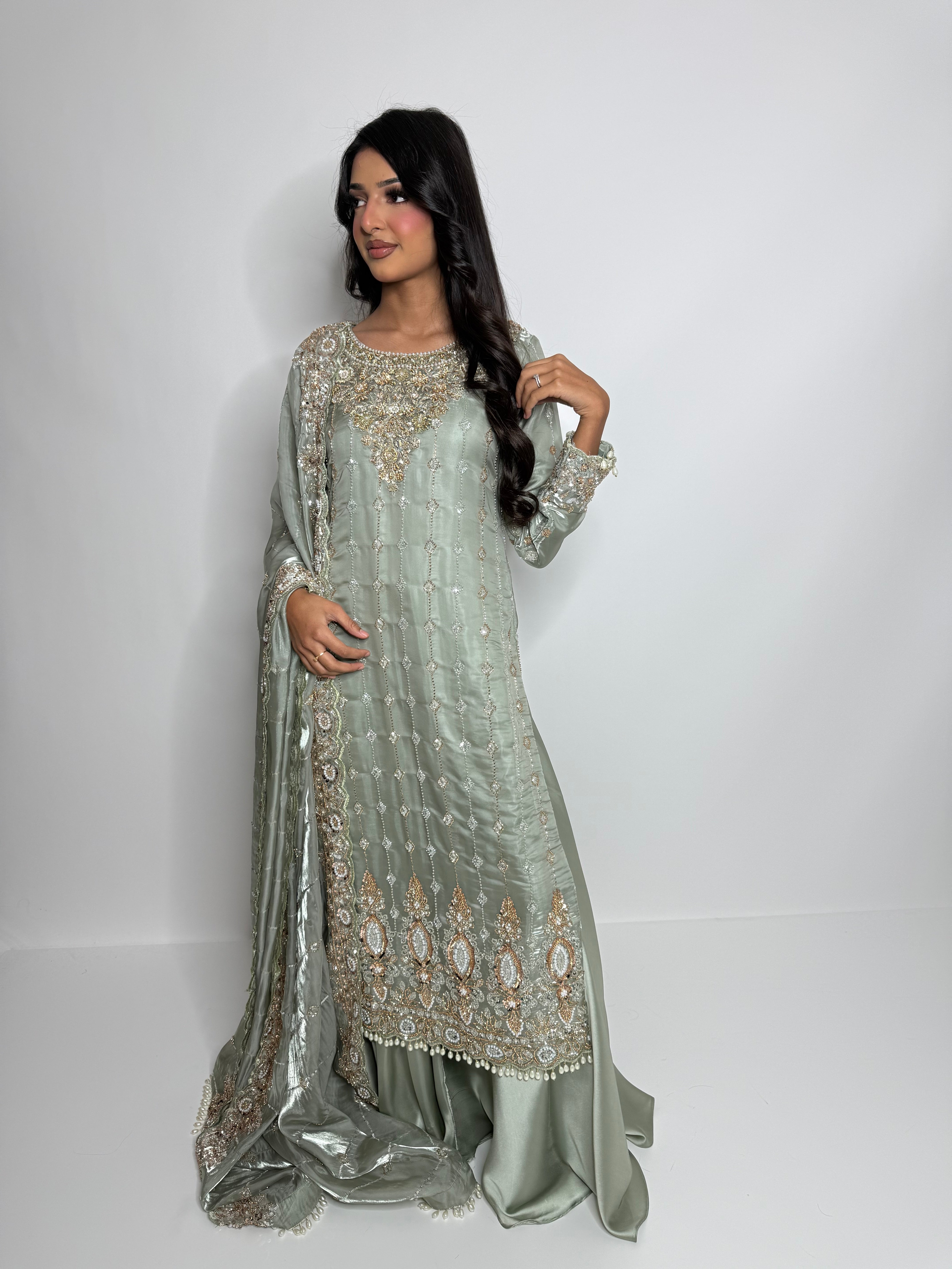 Wedding guest outfit in sage green silk