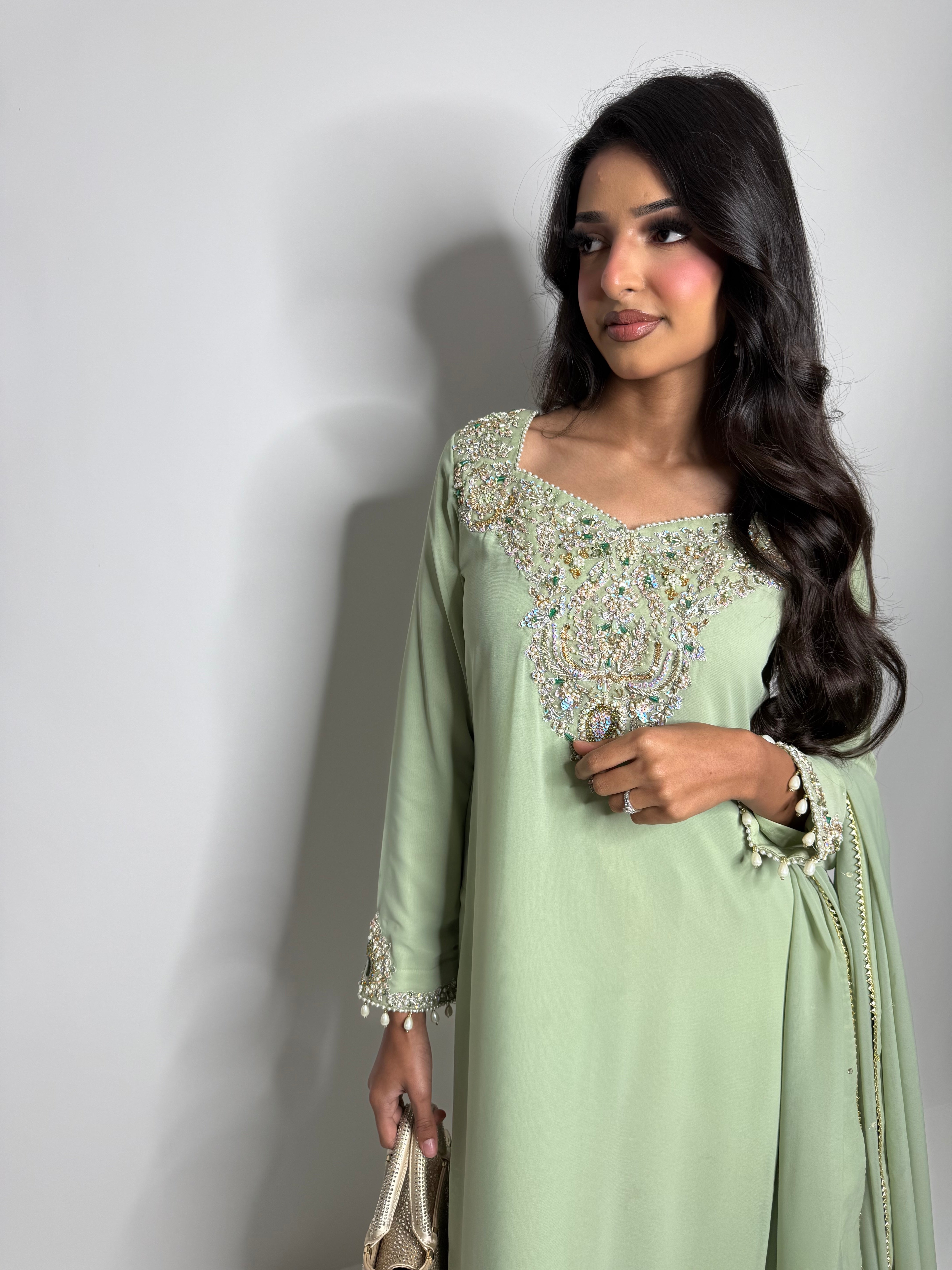 Sage green georgette outfit with hand embroidery
