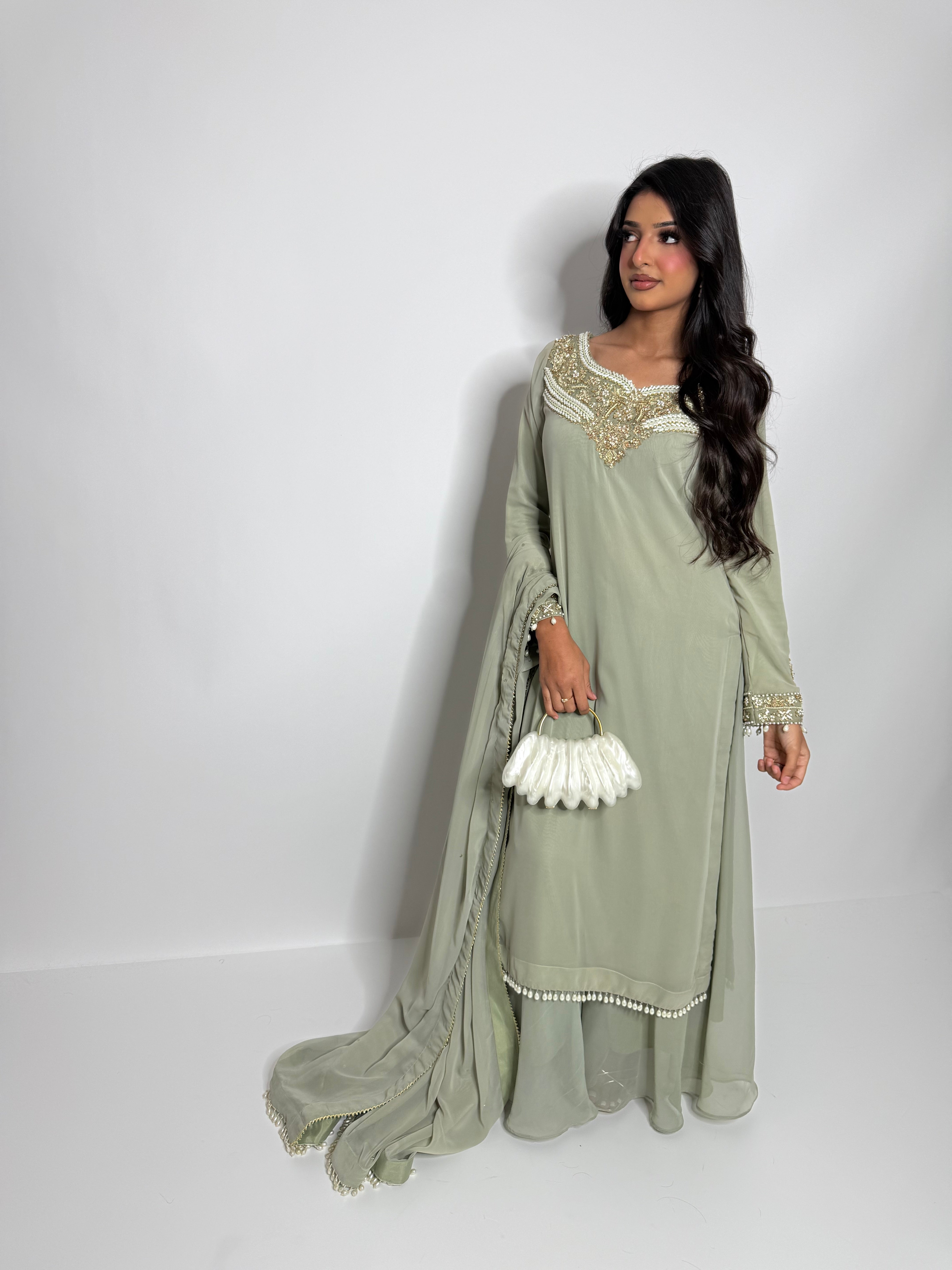 Dholki outfit with sage sharara and pearl finishing
