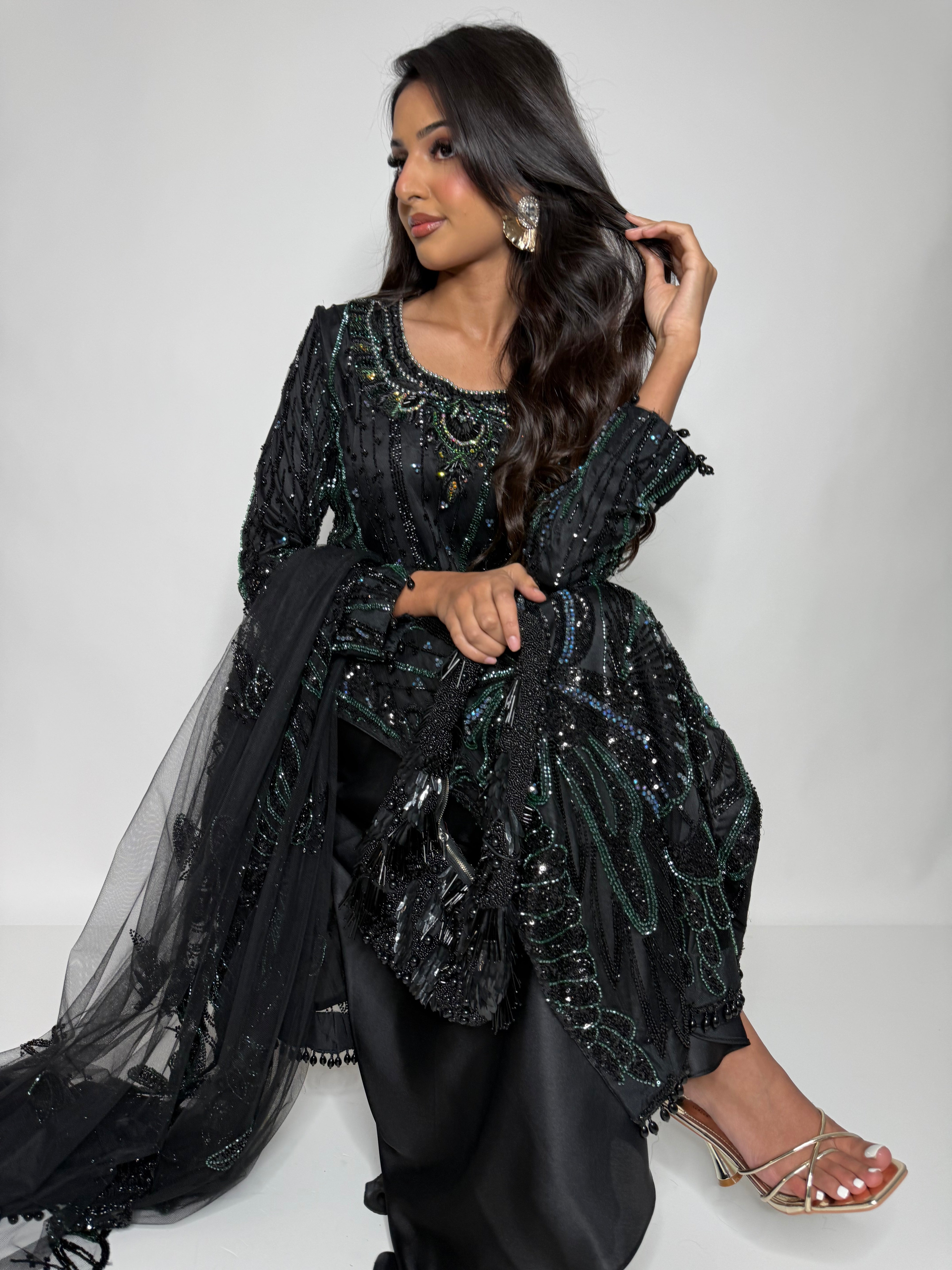 Zarelle Noir Emerald luxury black cutdana sharara suit with emerald embroidery front view. Great for Eid.