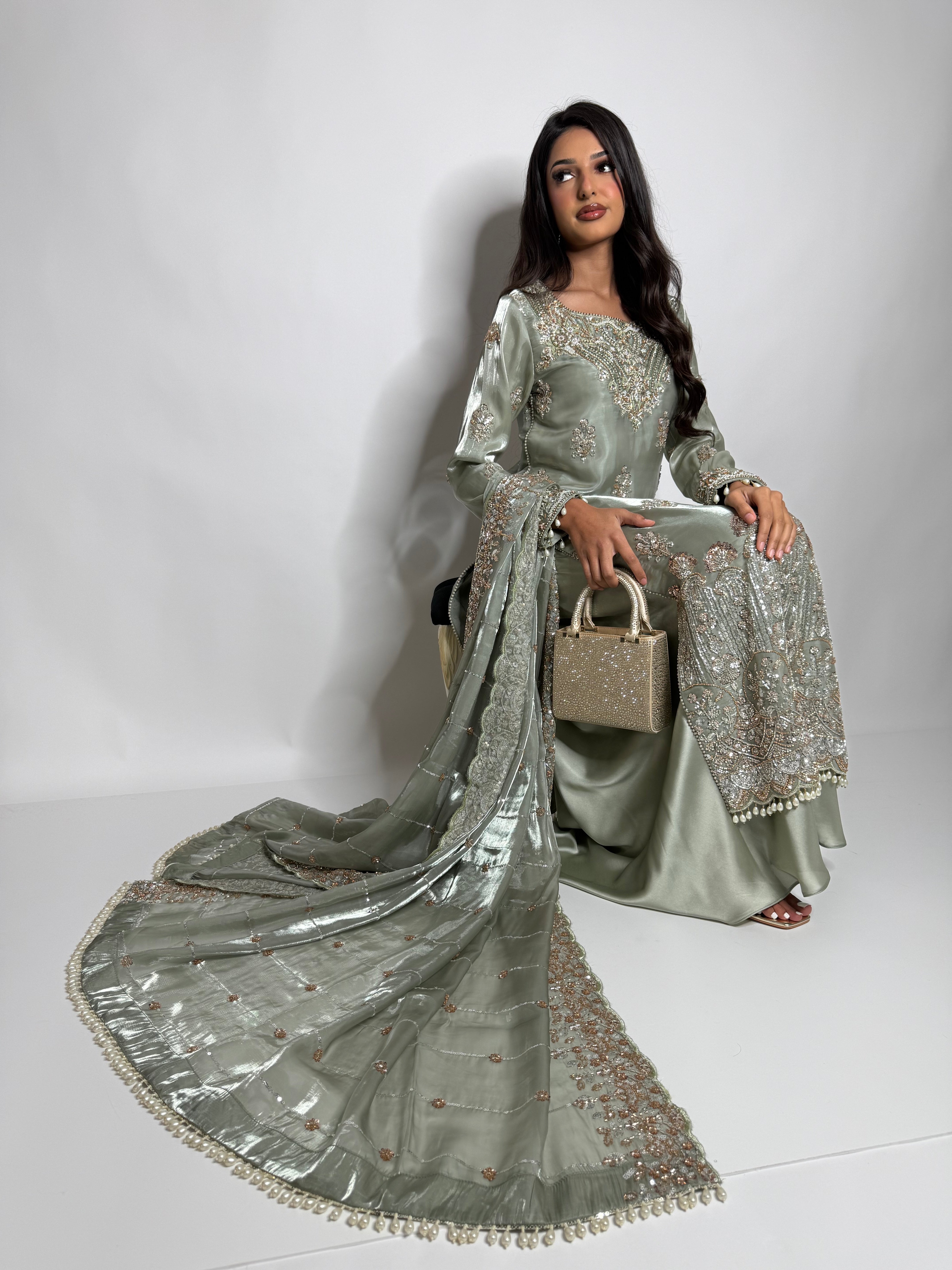 Luxury sage green silk Pakistani sharara suit with cutdana embroidery