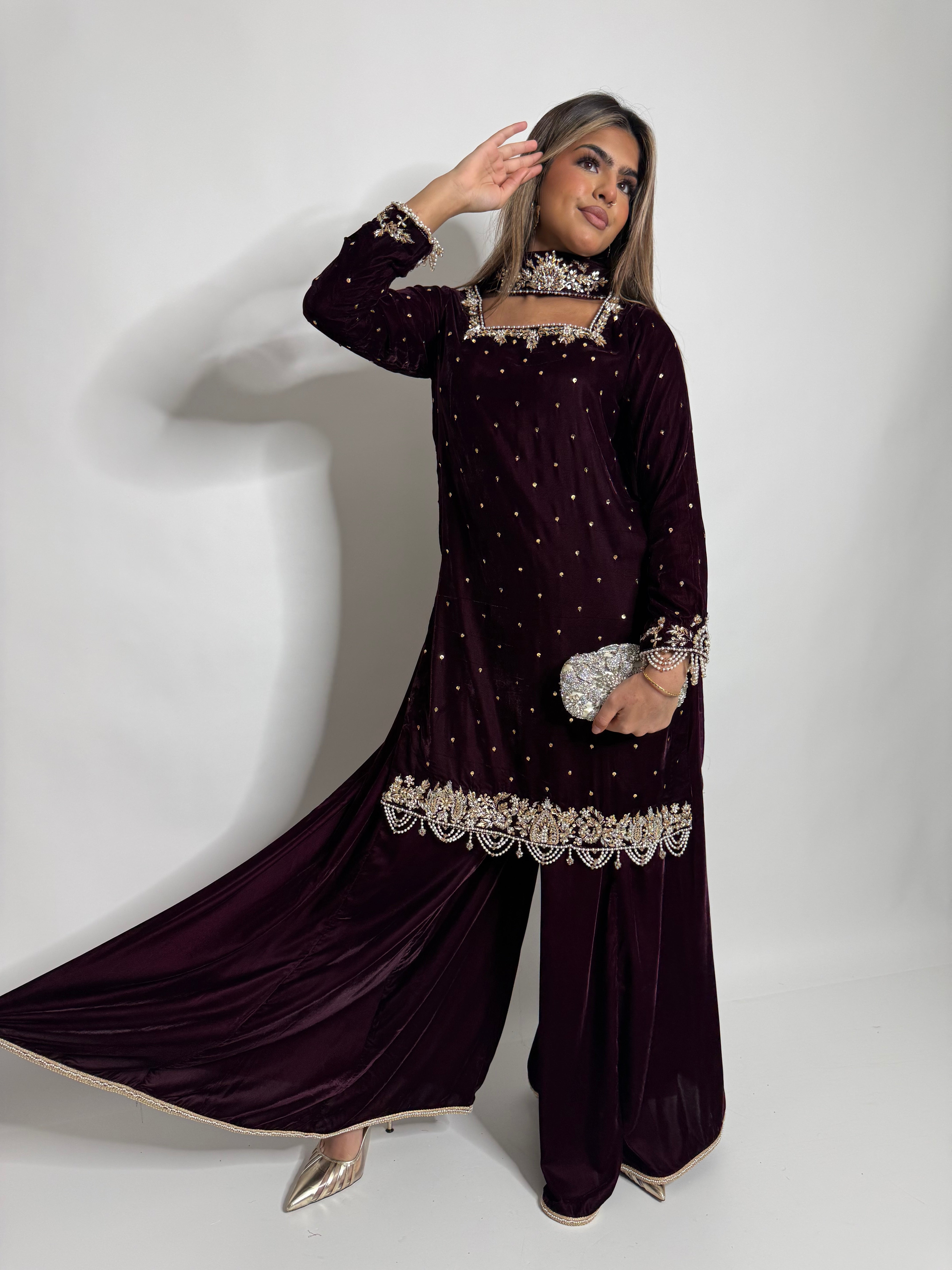 Plum velvet kameez with gold embroidered neckline detail