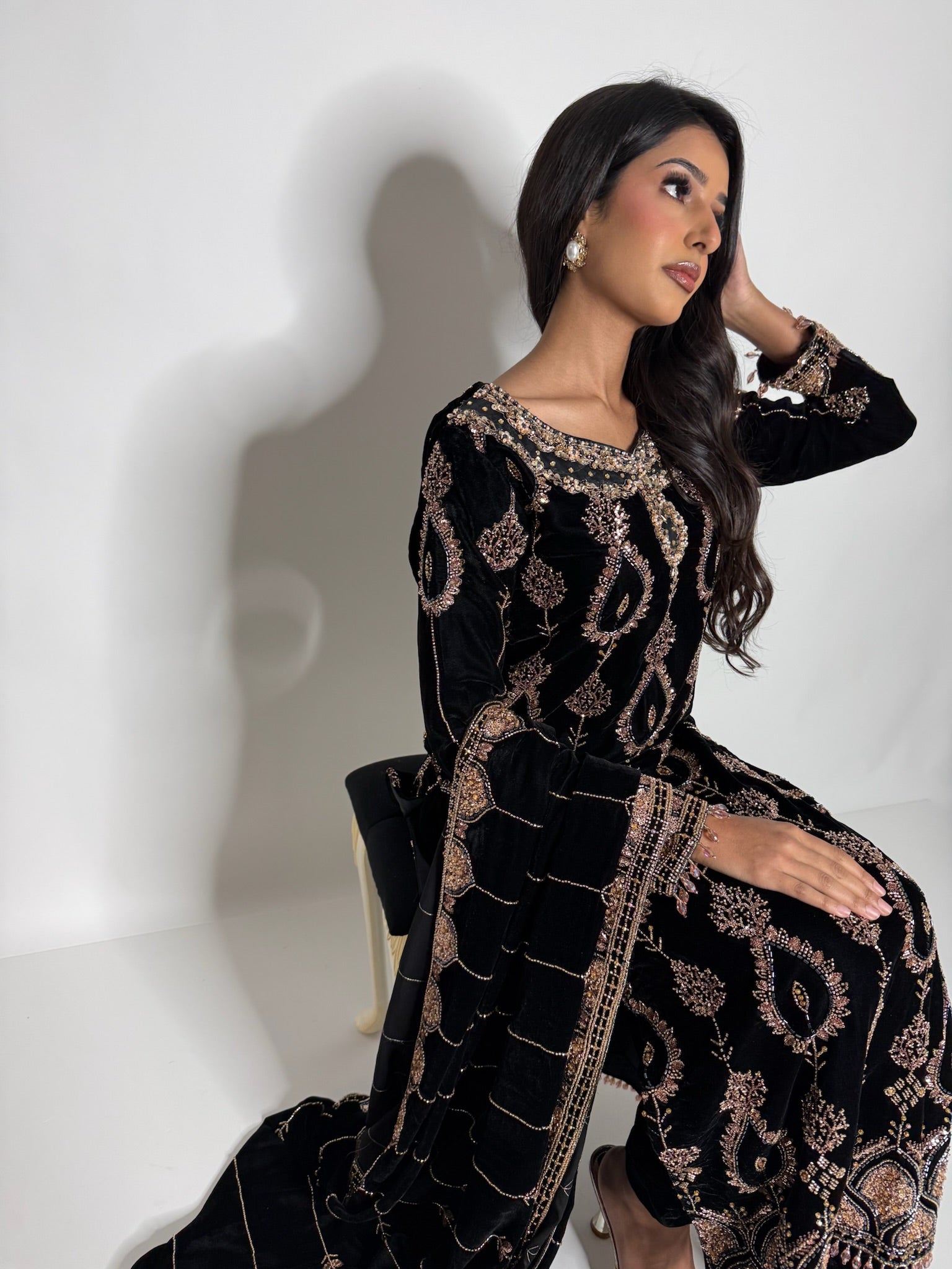 Statement black velvet three piece suit with embroidered shawl drape