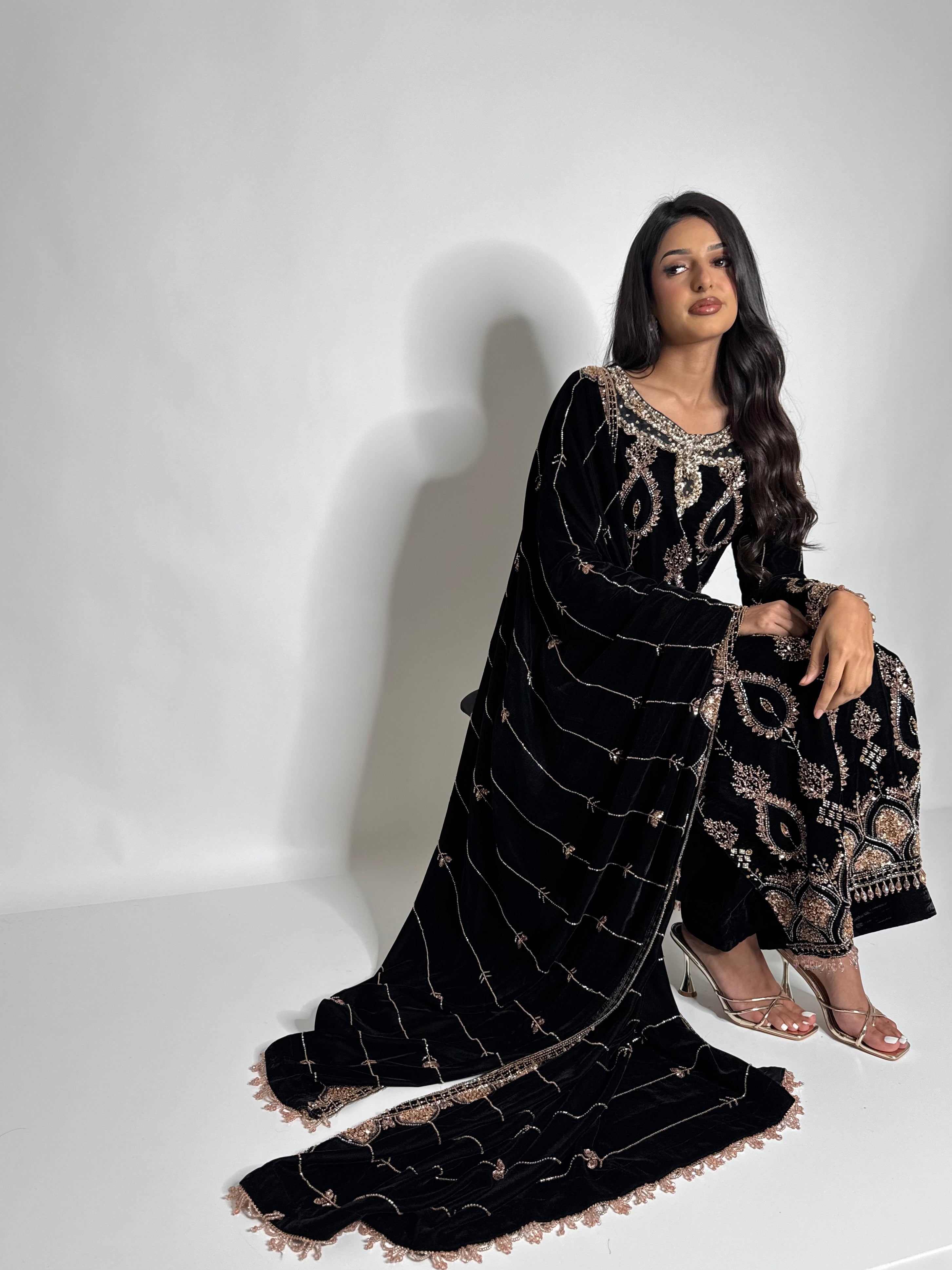 Black velvet Pakistani wedding guest outfit with embroidered shawl
