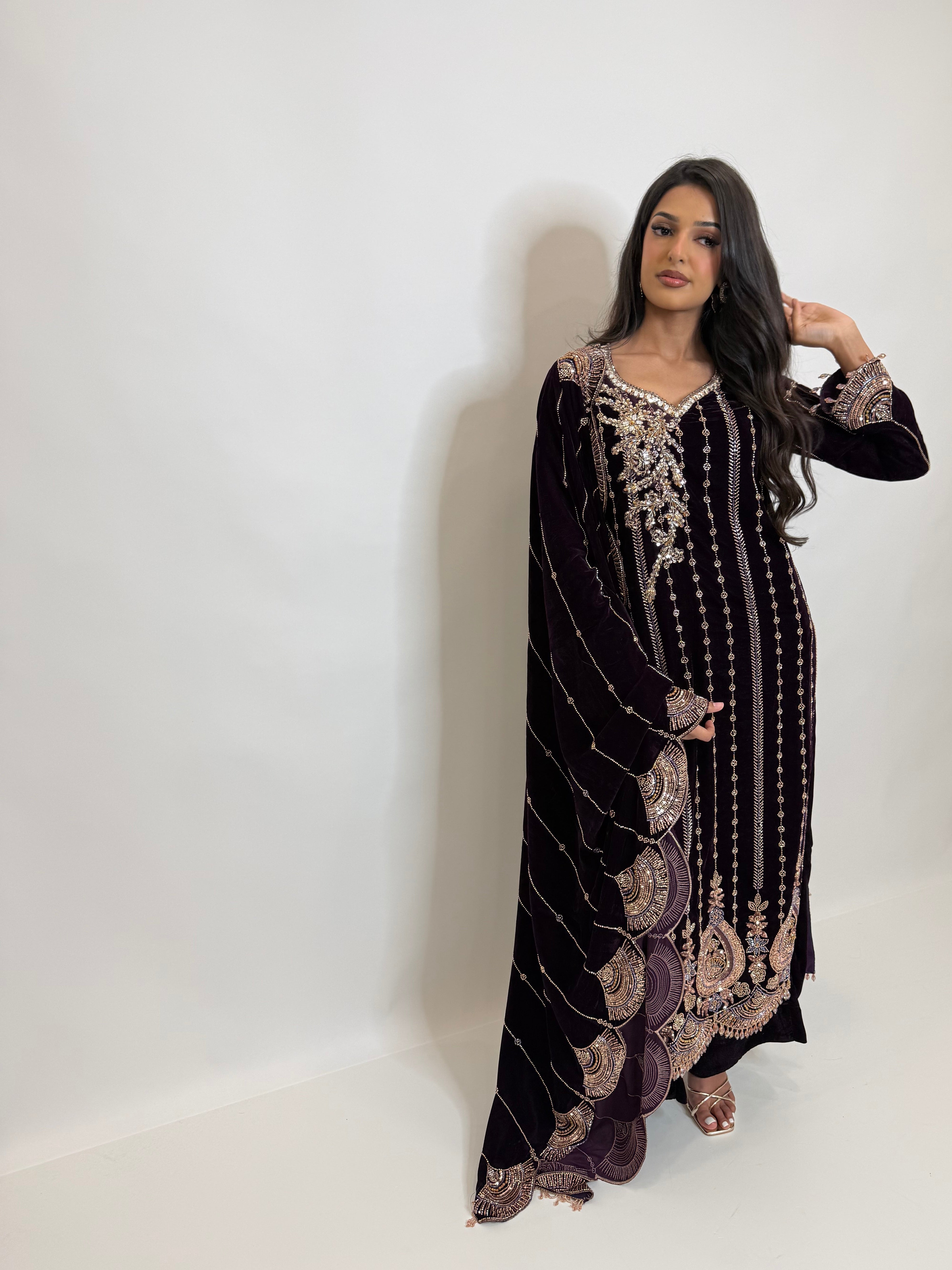 Cutdana hand embroidered neckline on deep violet velvet Pakistani suit