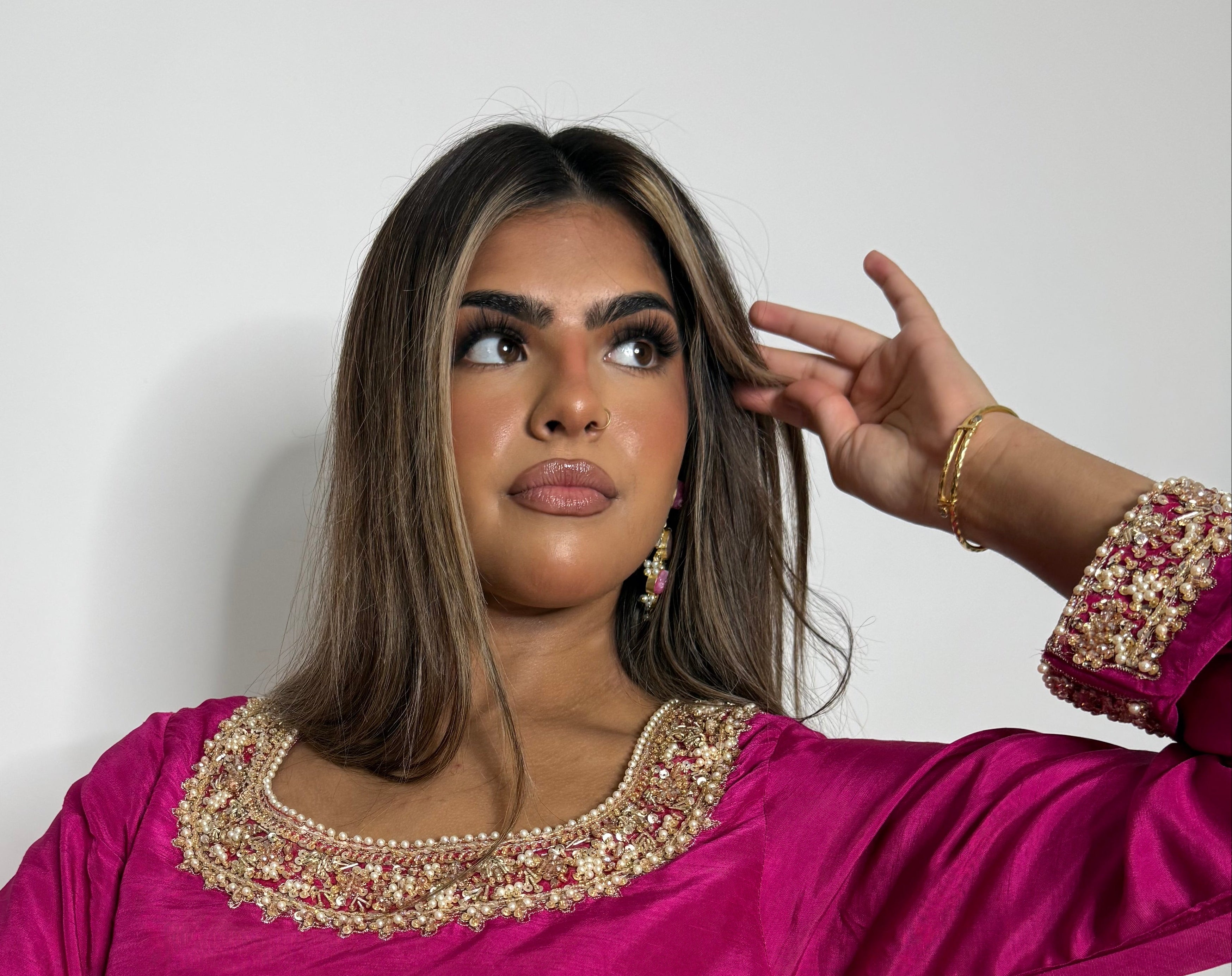 Fuchsia net dupatta with gold border finishing